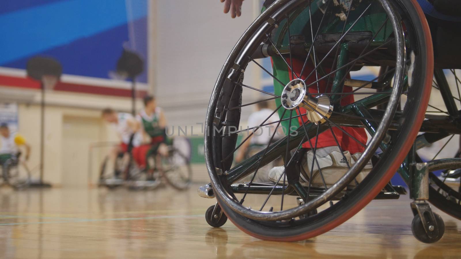 Disabled sportsmen plays wheelchair basketball by Studia72