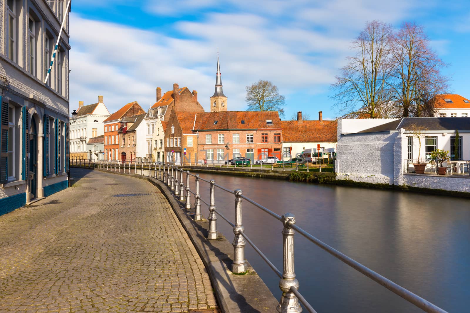Bruges (Brugge) cityscape with canal and houses in traditional architecture style, most popular tourist destination in Belgium