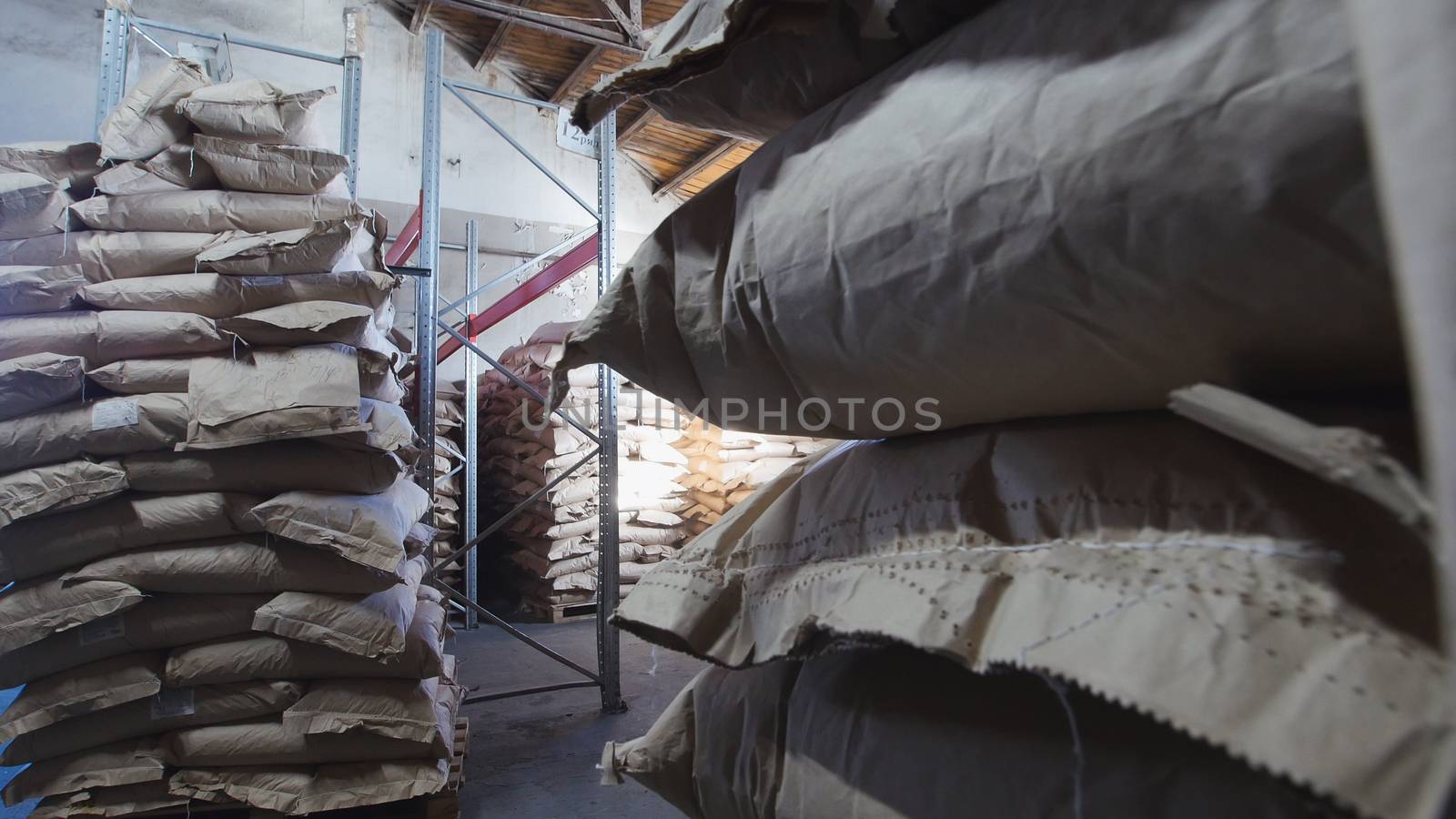 The large warehouse with packs of pasta at the macaroni manufacturing, close up