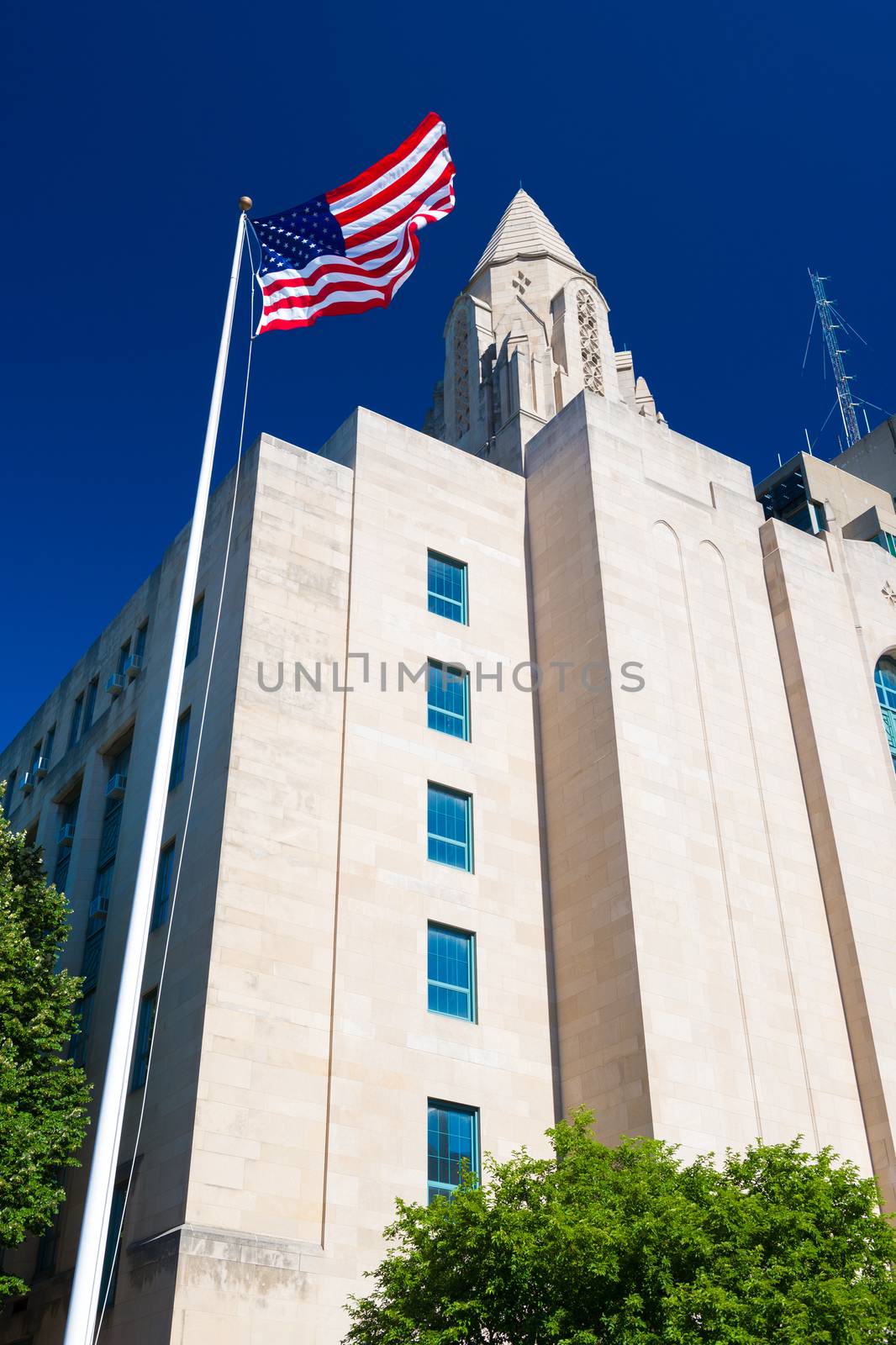 Boston, Massachusetts - June 2016, USA: Boston University building with American flag on flagpole