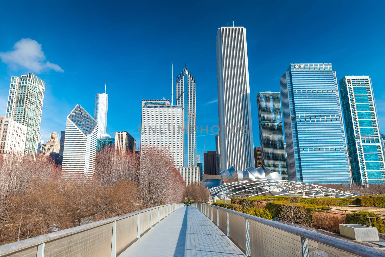Chicago - March 2017, IL, USA: View of skyscrapers and office buildings in downtown Chicago. Nichols Bridgeway in Millennium Park