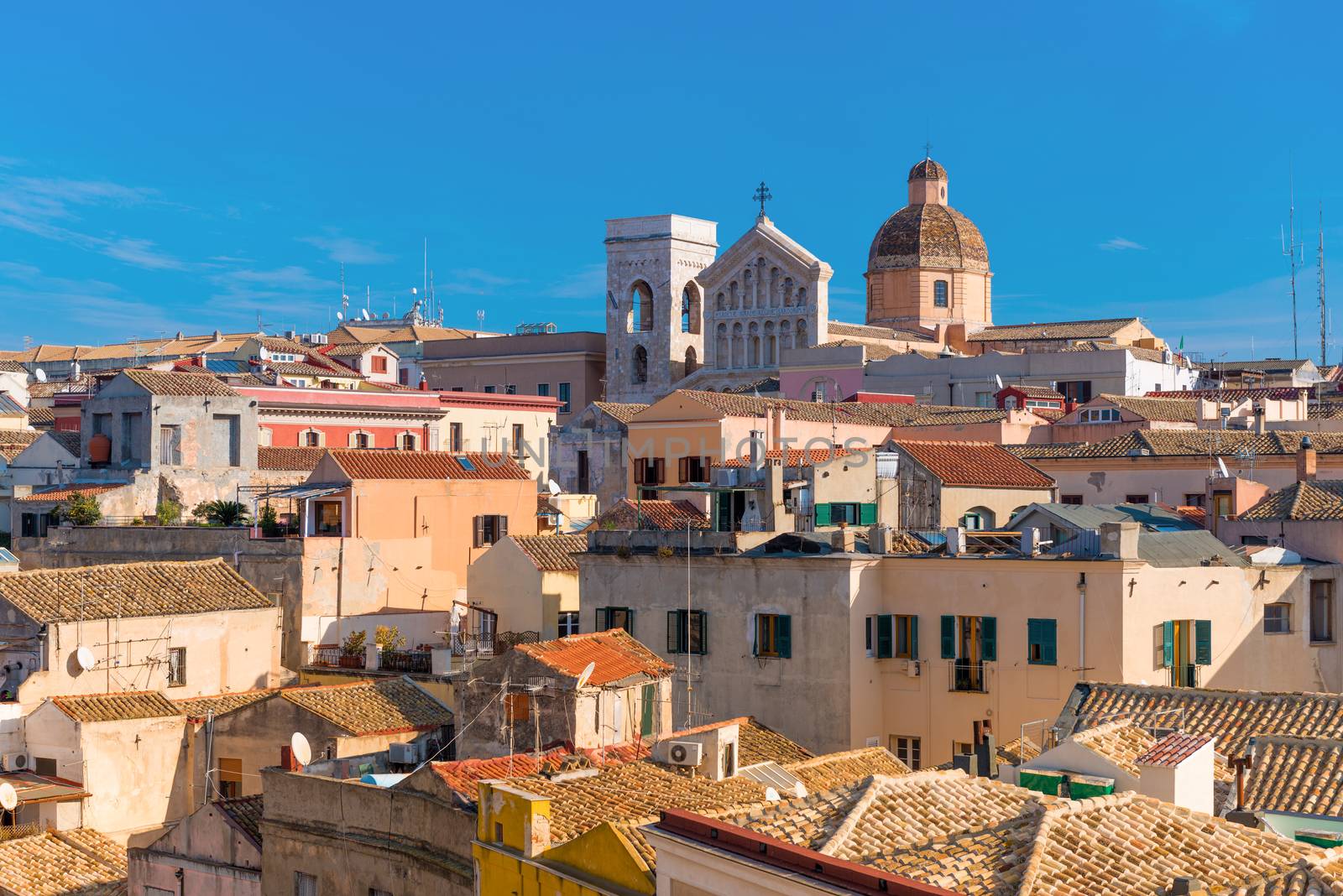 Cagliari, Sardinia - January 2016, Italy: Old city center, roofs of historical buildings and Cathedral of Cagliari, view from tower - "Torre dell Elefante"