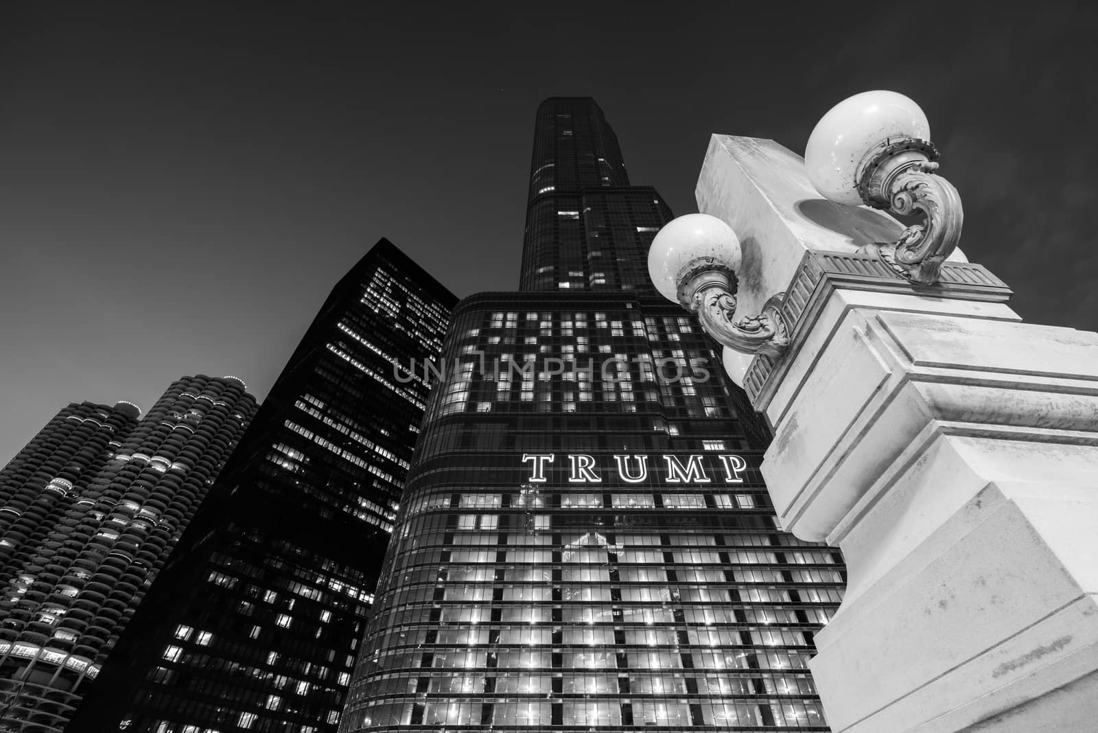 Chicago - March 2017, IL, USA: The Trump Tower skyscraper at night. High rise building of one of the most famous skyscrapers in the city of Chicago, black and white photo