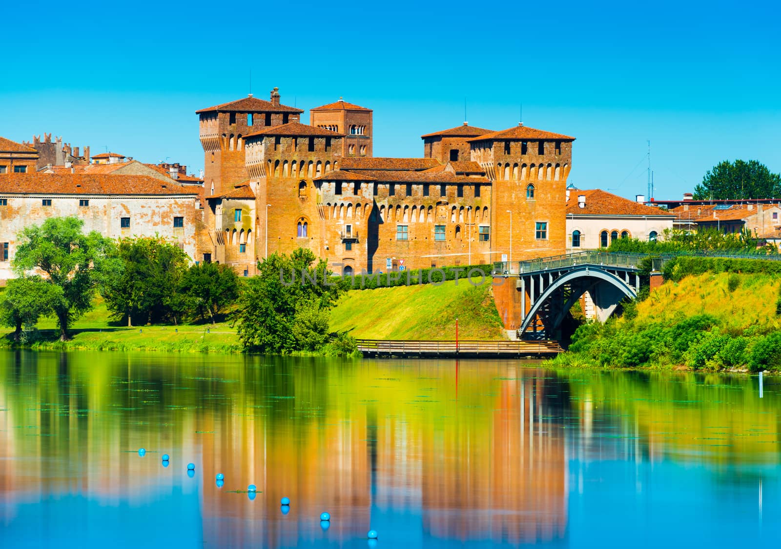 Mantova - August 2017, Italy: Castle of Saint George reflected in water. One of the main landmarks in Mantua