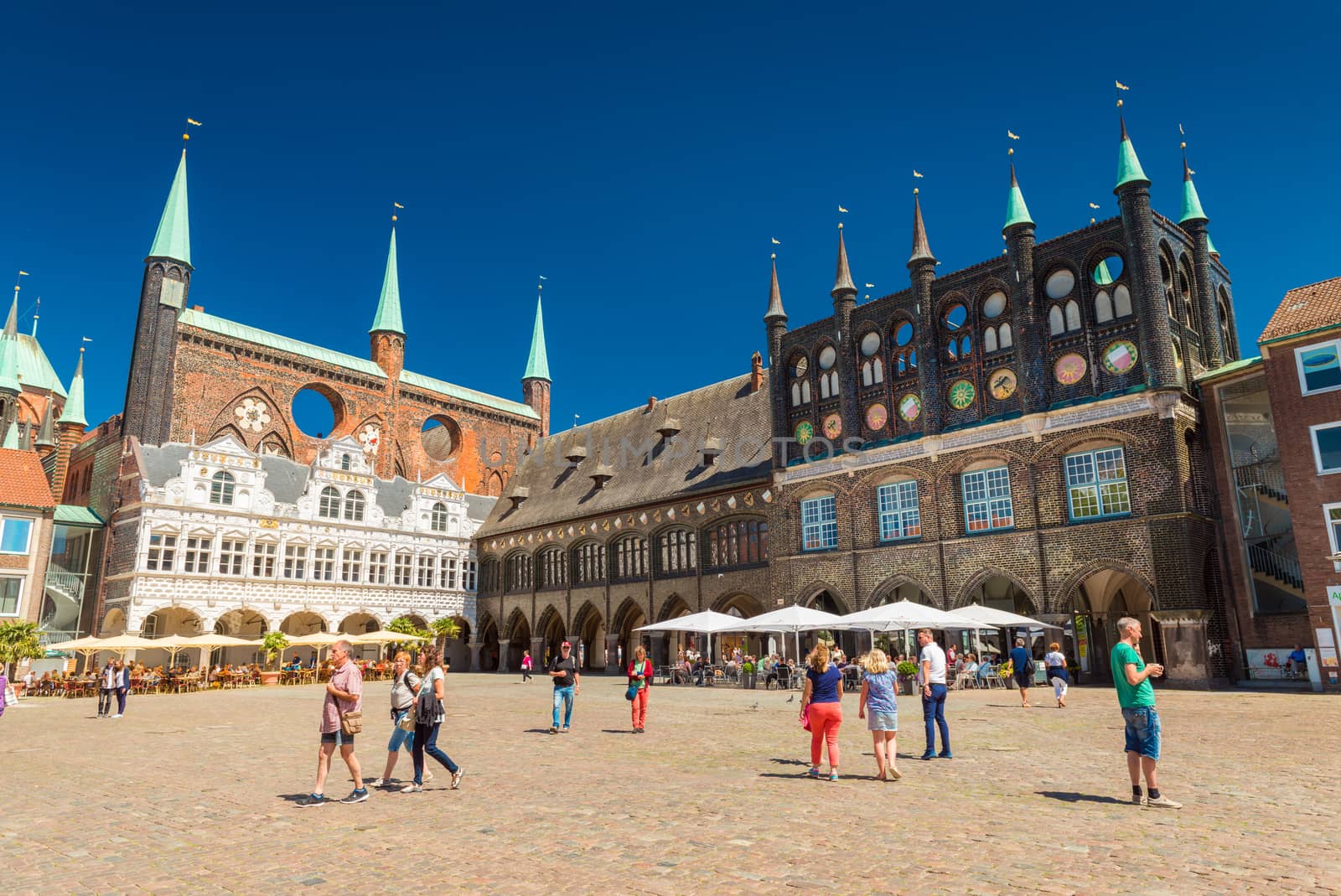 Lubeck - July 2018, Germany:  View of the central square of Lubeck and City Administration building. One of the most visited cities in northern Germany. Popular touristic destination
