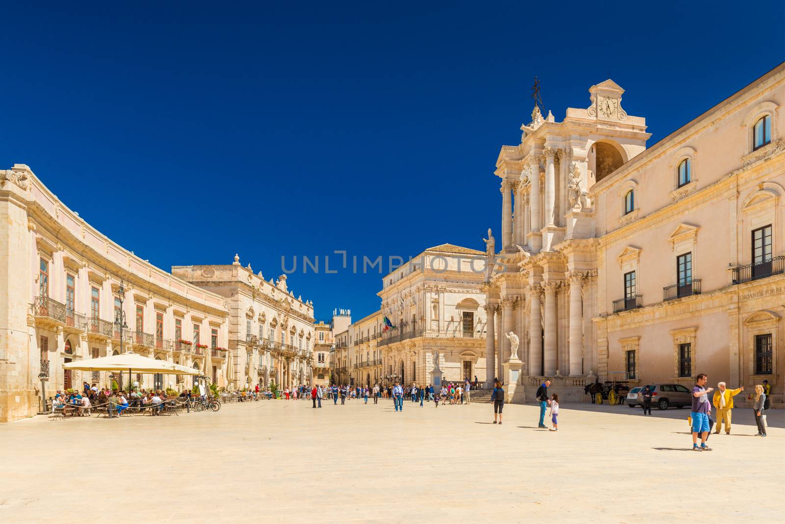 Ortygia - April 2019, Syracuse, Italy: View of The Cathedral of Syracuse and the central square (Piazza Duomo)