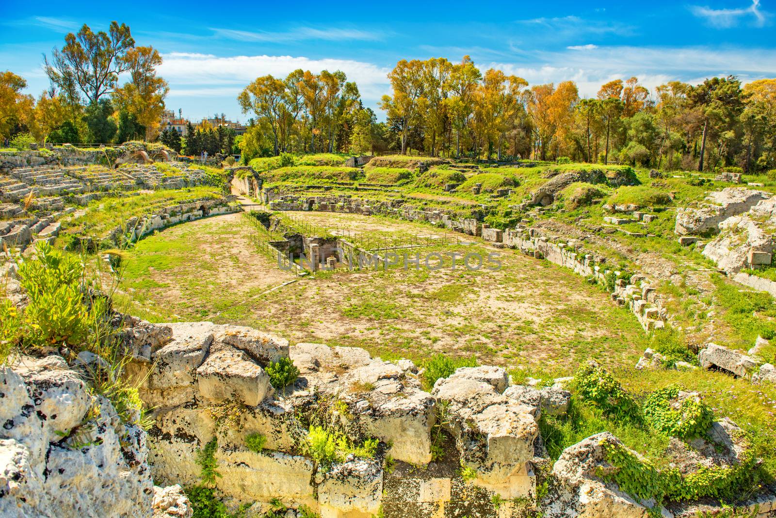 Syracuse - April 2019, Italy: The Roman Amphitheater in the Neapolis Archaeological Park