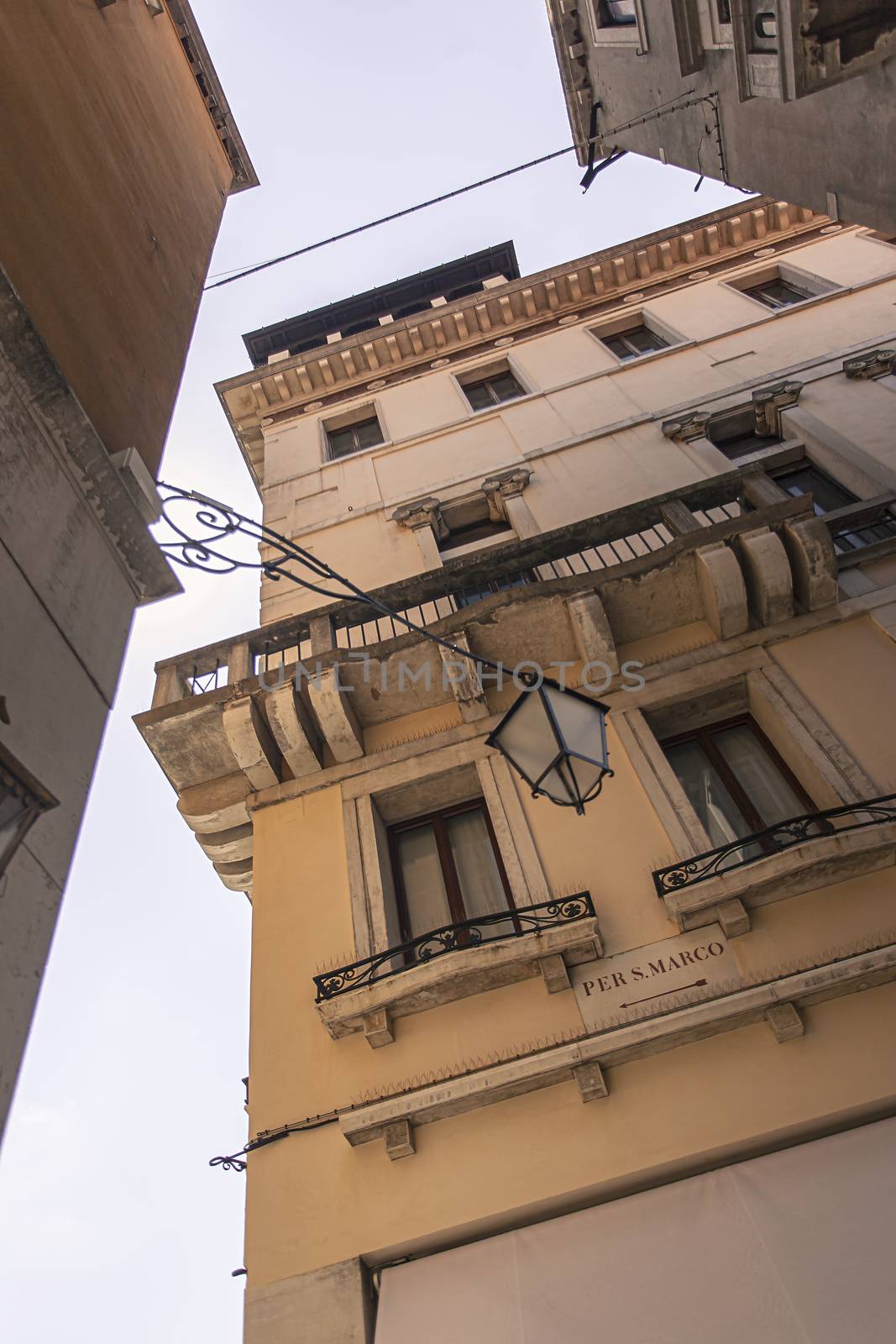 Detail of building with window and details and architecture in Venice in Italy
