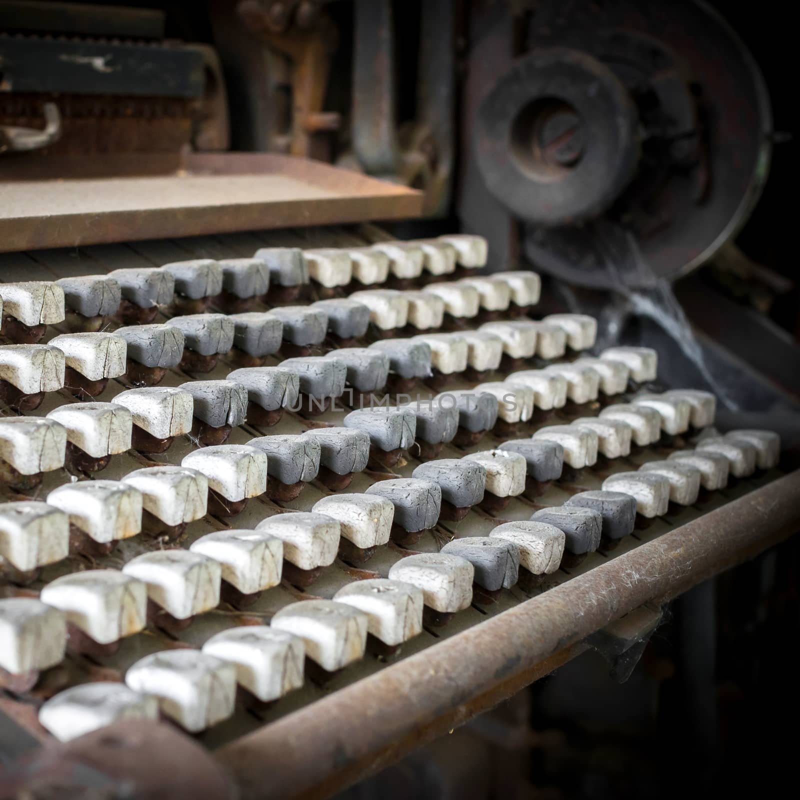 Detail of ancient keyboard, close up on rotten keys.