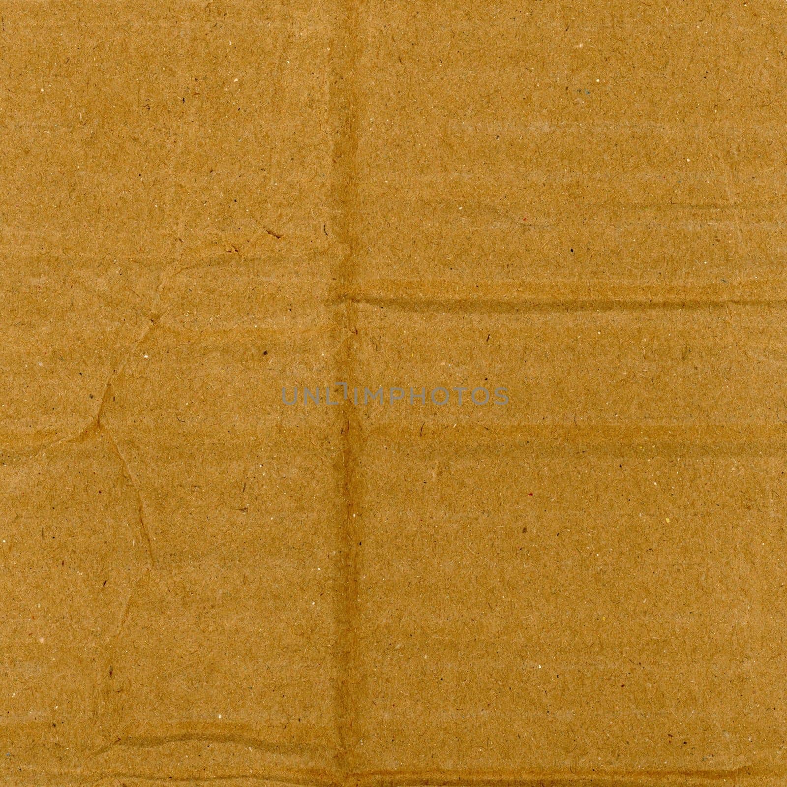 grunge brown corrugated cardboard texture useful as a background