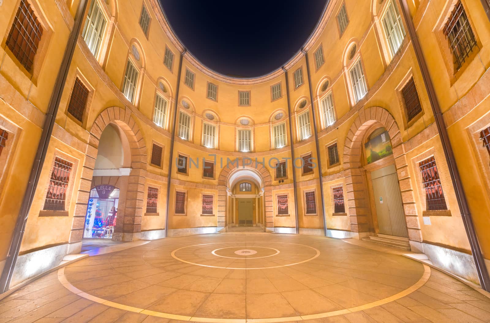 Ferrara - December 2014, Italy: View of the Rotonda Foschini building, the internal court of the Teatro Comunale (Communal Theatre), on a foggy winter evening