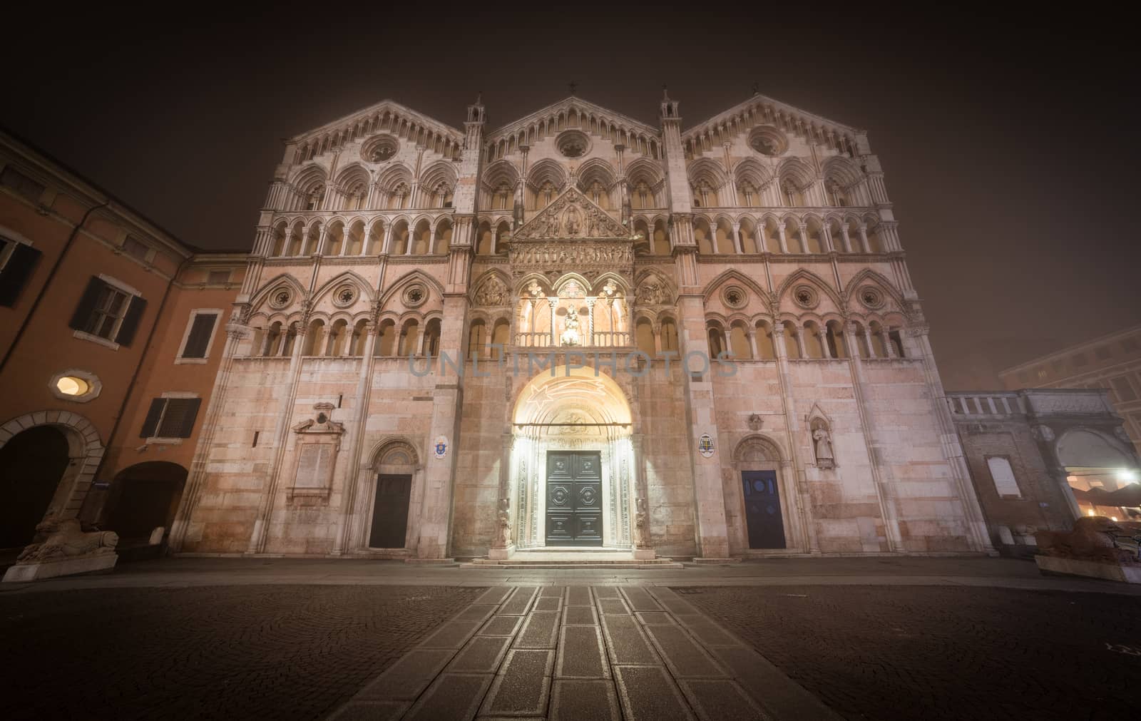 Ferrara - December 2013, Italy: Cathedral of Ferrara in foggy evening