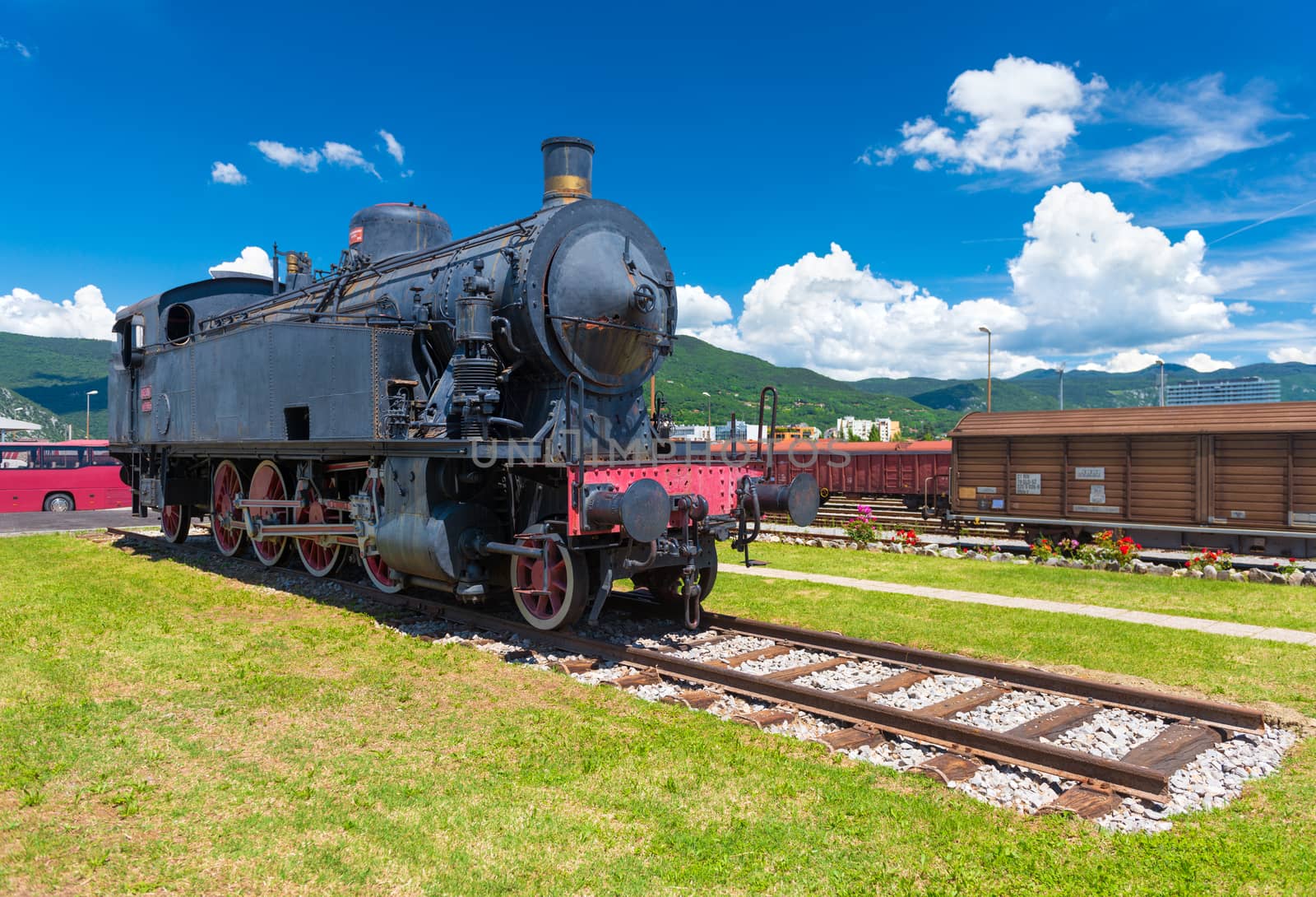 Nova Gorica (Gorizia) - June 2016, Slovenia: Old steam locomotive on rails against the blue sky, the landmark is situated in the city of Nova Gorica, close to the Slovenian Italian border