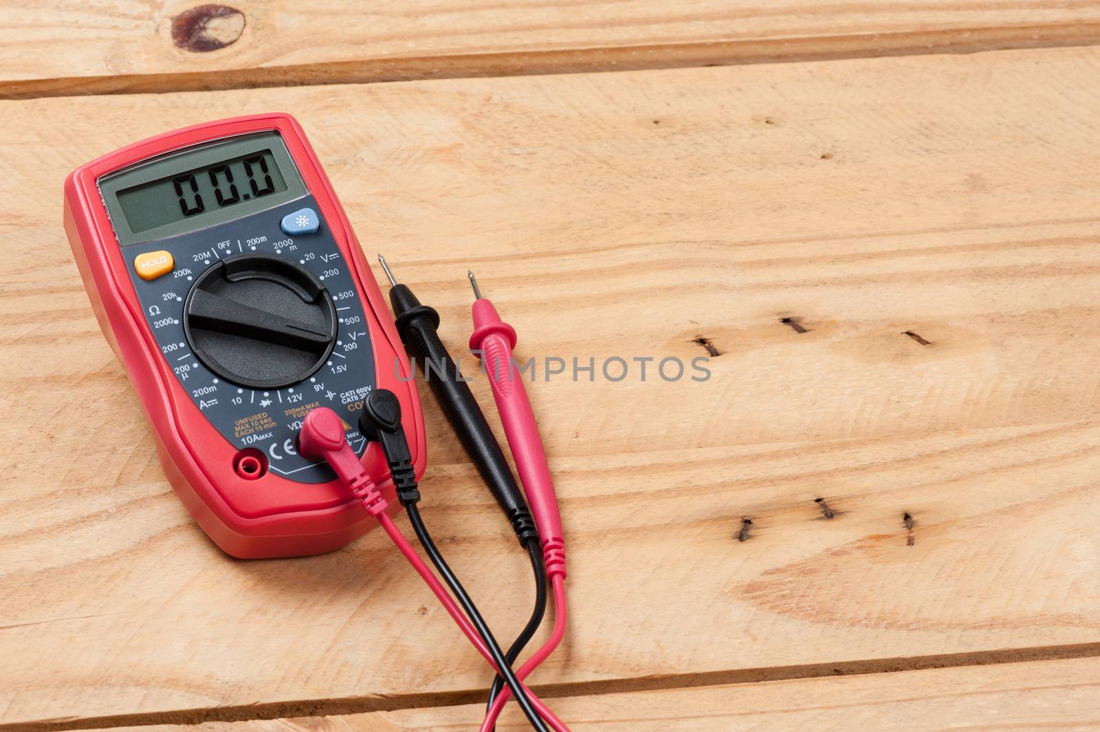 digital multimeter or multitester or Volt-Ohm meter, an electronic measuring instrument that combines several measurement functions in one unit.