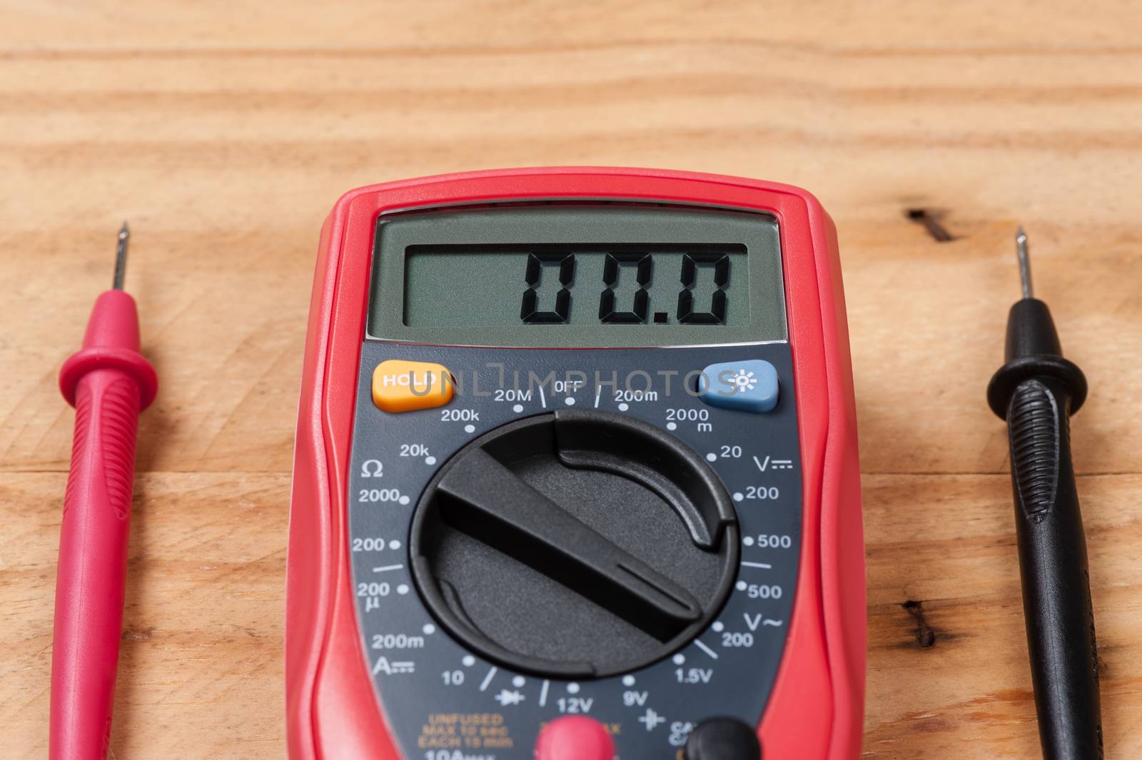 digital multimeter or multitester or Volt-Ohm meter, an electronic measuring instrument that combines several measurement functions in one unit.