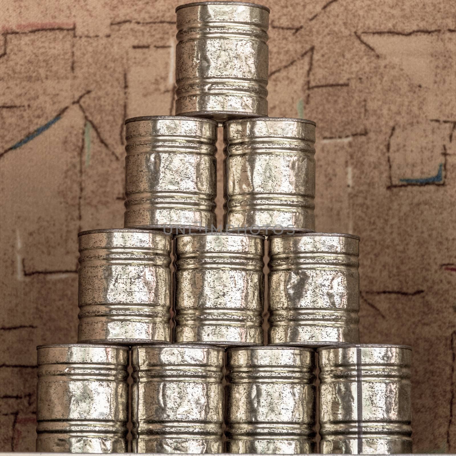 Pyramid of tin cans for can throwing at a fair by geogif