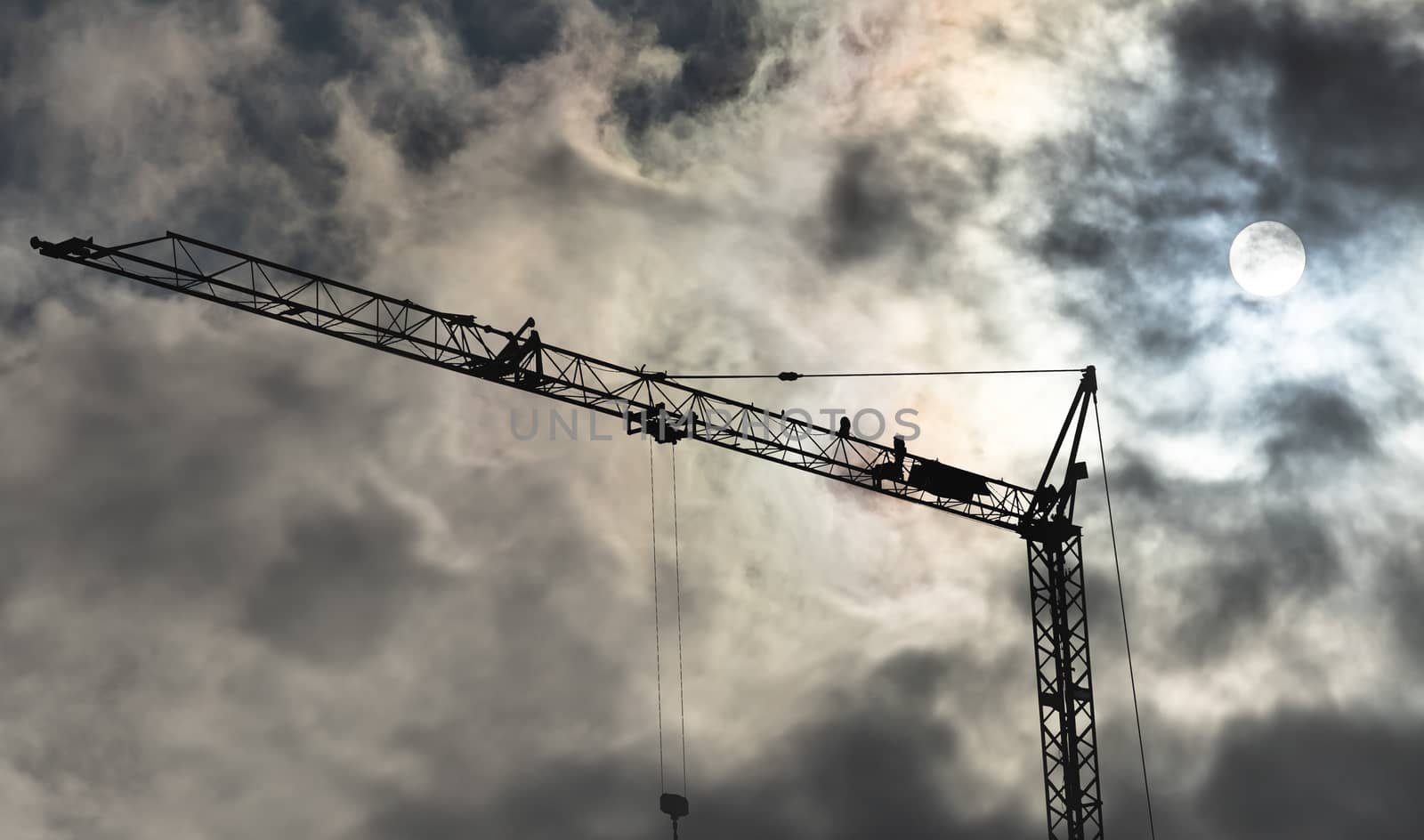 High black construction crane in front of a dramatic threatening sky with translucent sun behind the clouds, germany