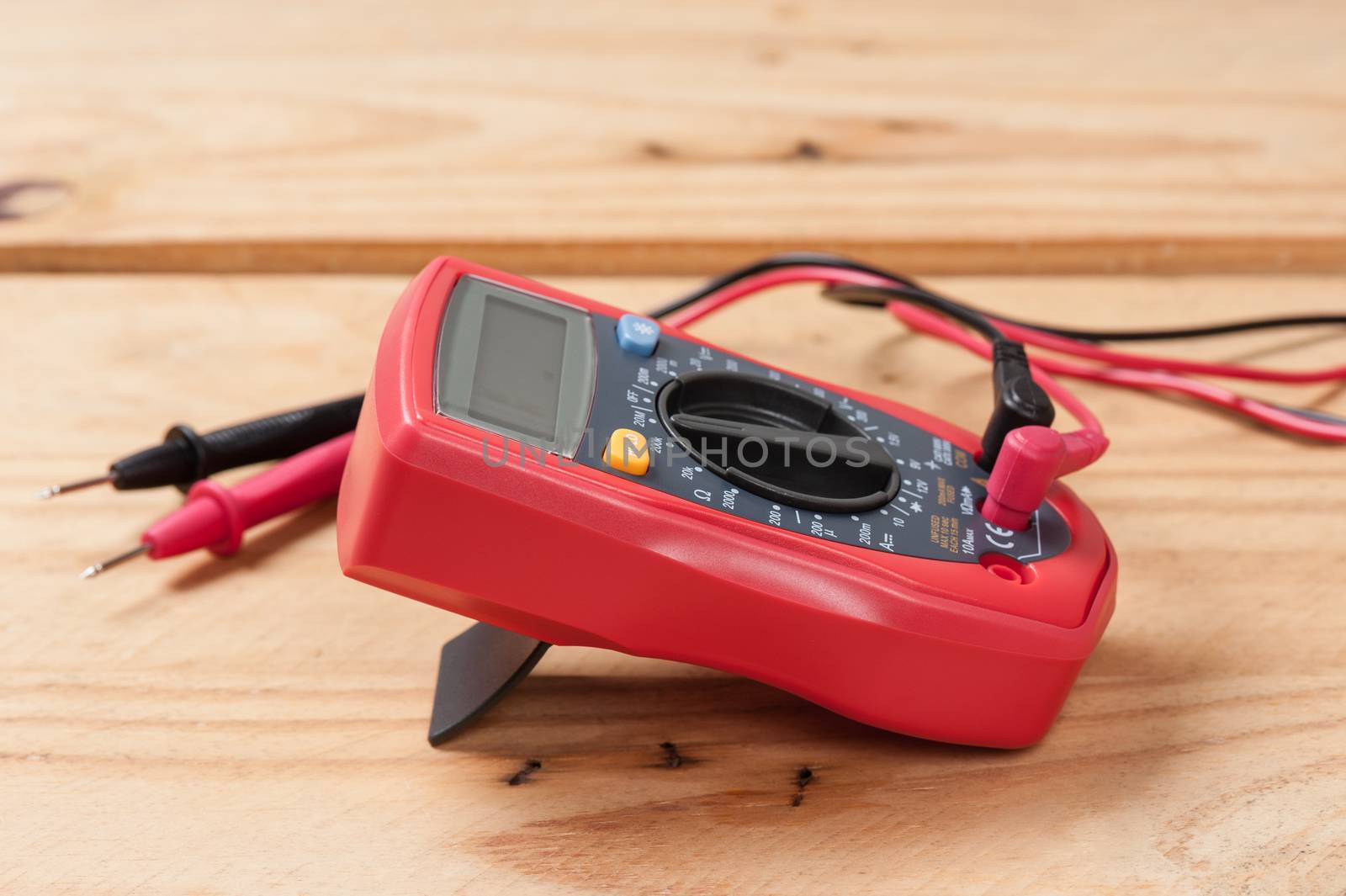 red digital multimeter by norgal