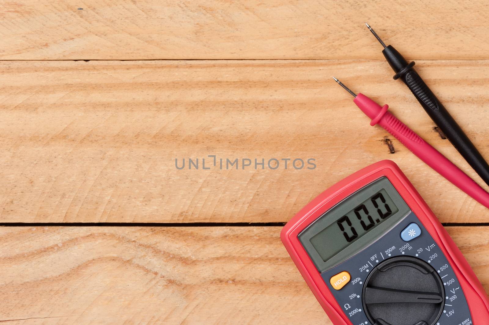 digital multimeter or multitester or Volt-Ohm meter, an electronic measuring instrument that combines several measurement functions in one unit.