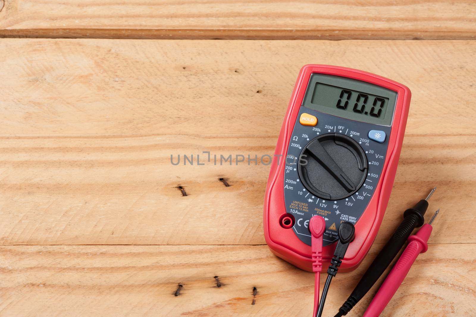 digital multimeter or multitester or Volt-Ohm meter, an electronic measuring instrument that combines several measurement functions in one unit.