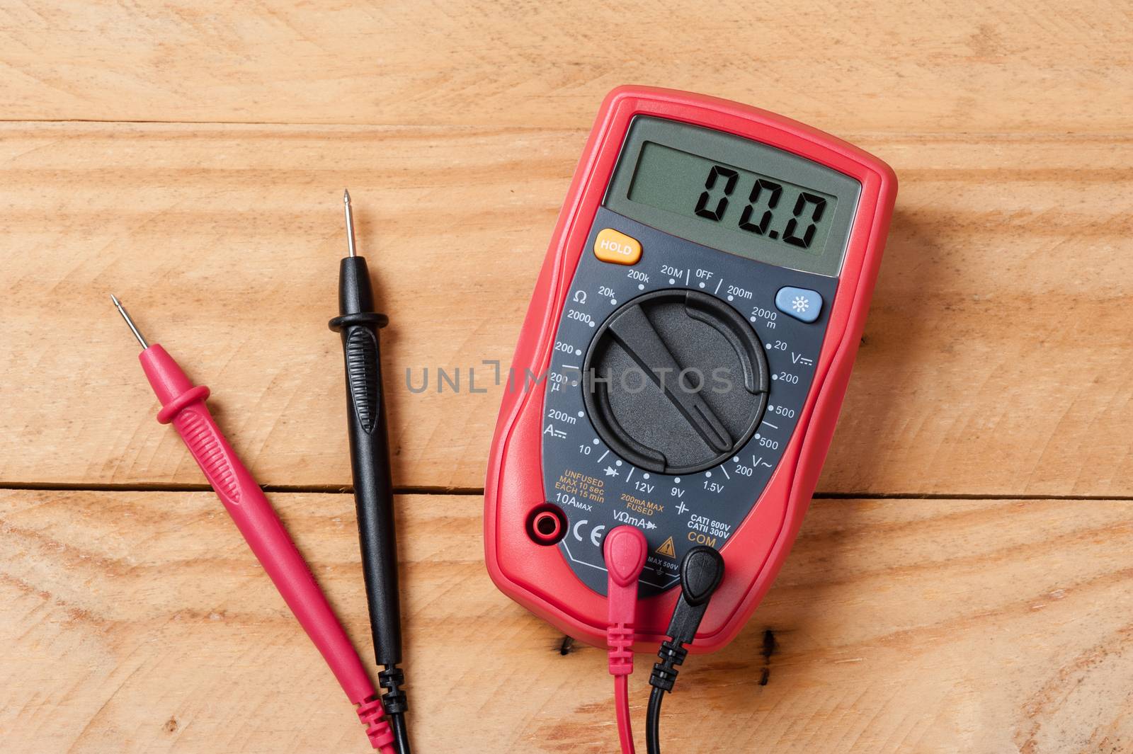 digital multimeter or multitester or Volt-Ohm meter, an electronic measuring instrument that combines several measurement functions in one unit.