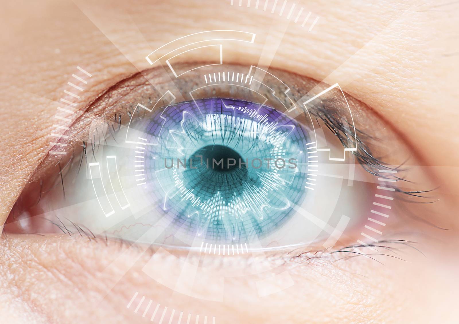 Close-up of woman's blue eye. High Technologies in the futuristic. : contact lens