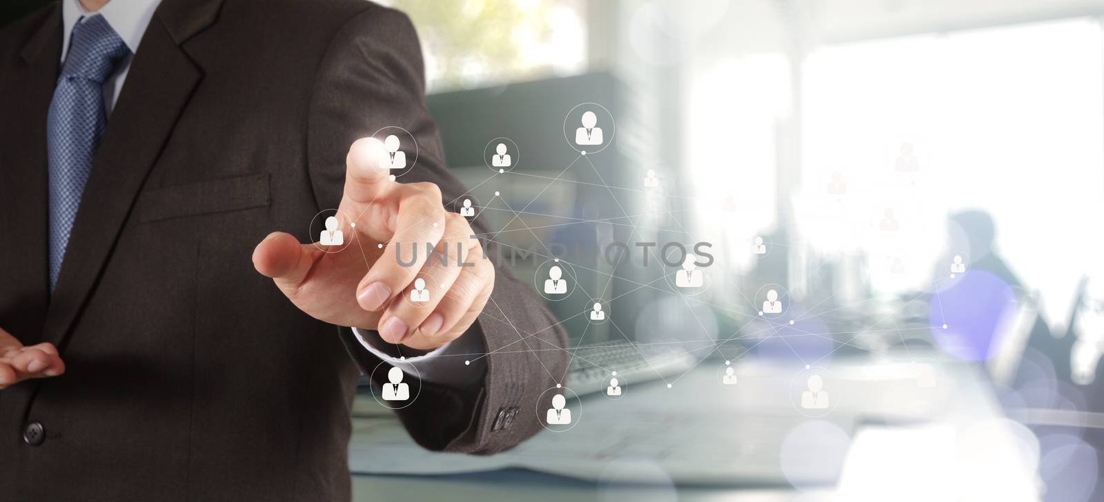 businessman hand showing human icon flow chart on new modern com by everythingpossible