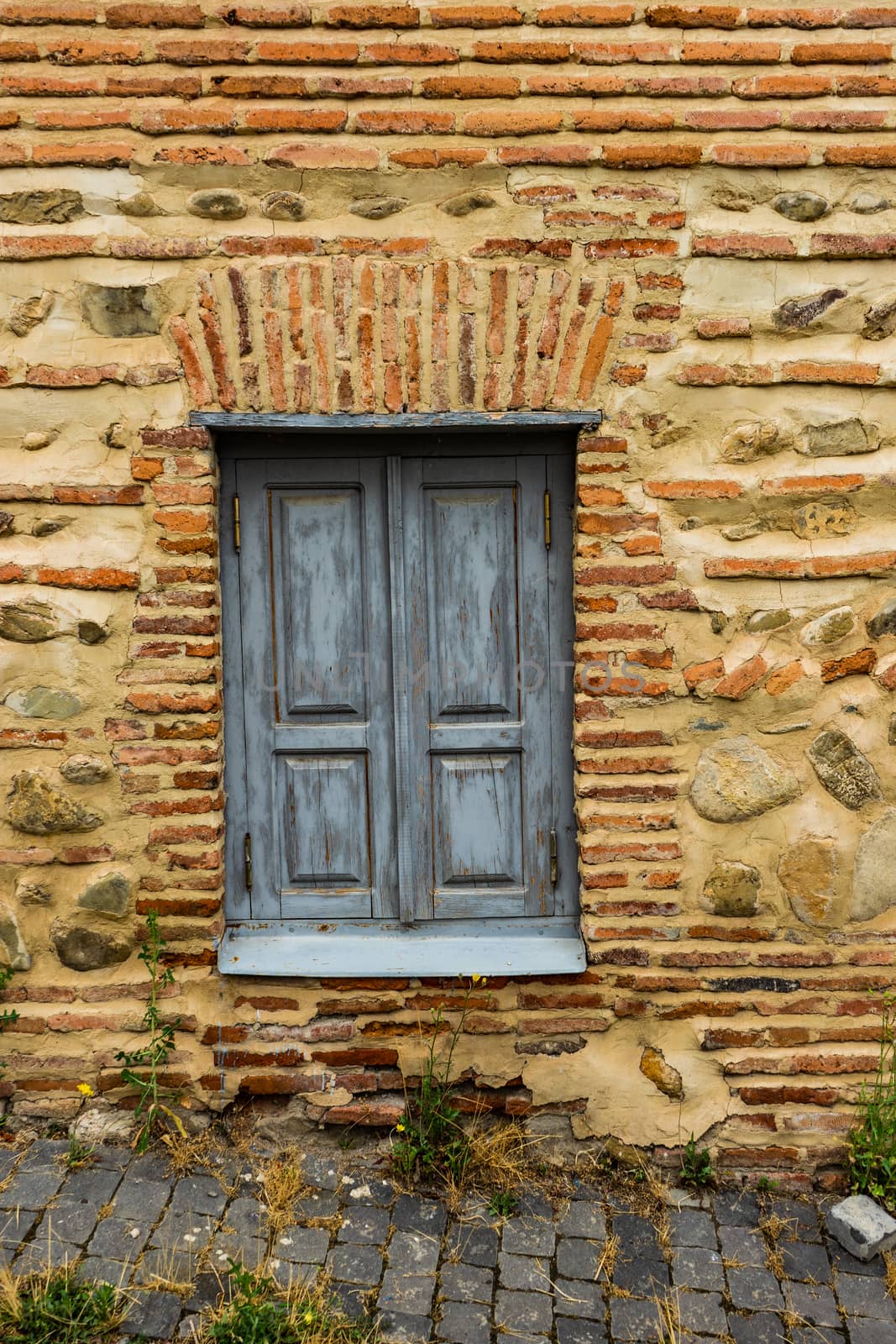 Window and walls in Old Sighnaghi, travel around Georgia