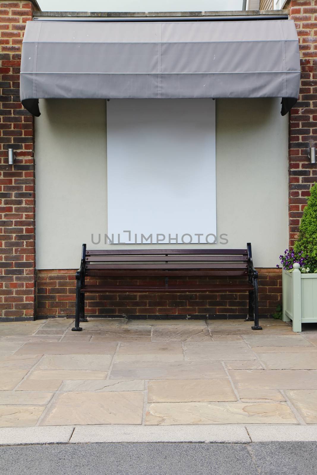 Shopfront vintage store front with canvas awnings and blank disp by everythingpossible