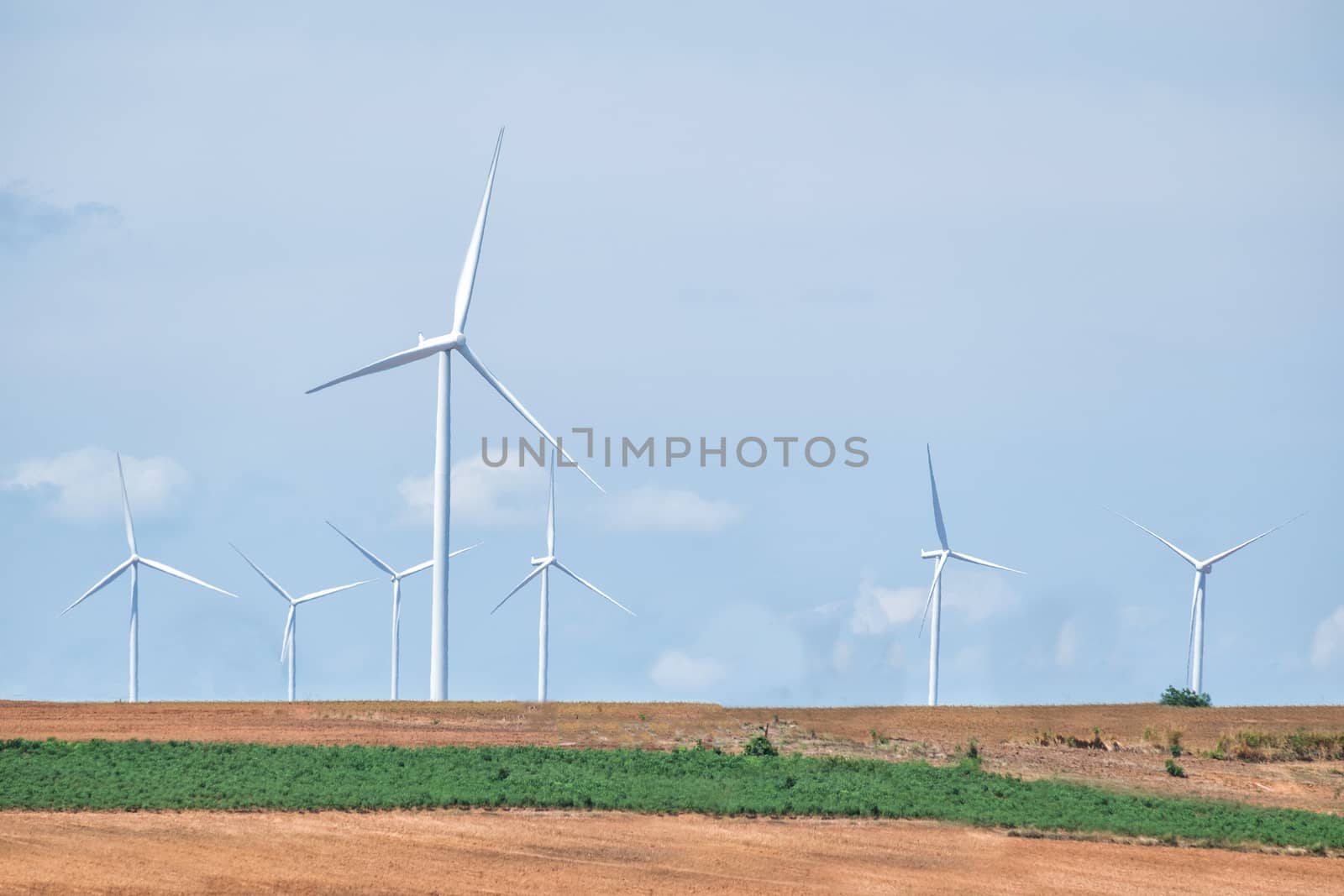 Wind turbine power at daylight  by Surasak