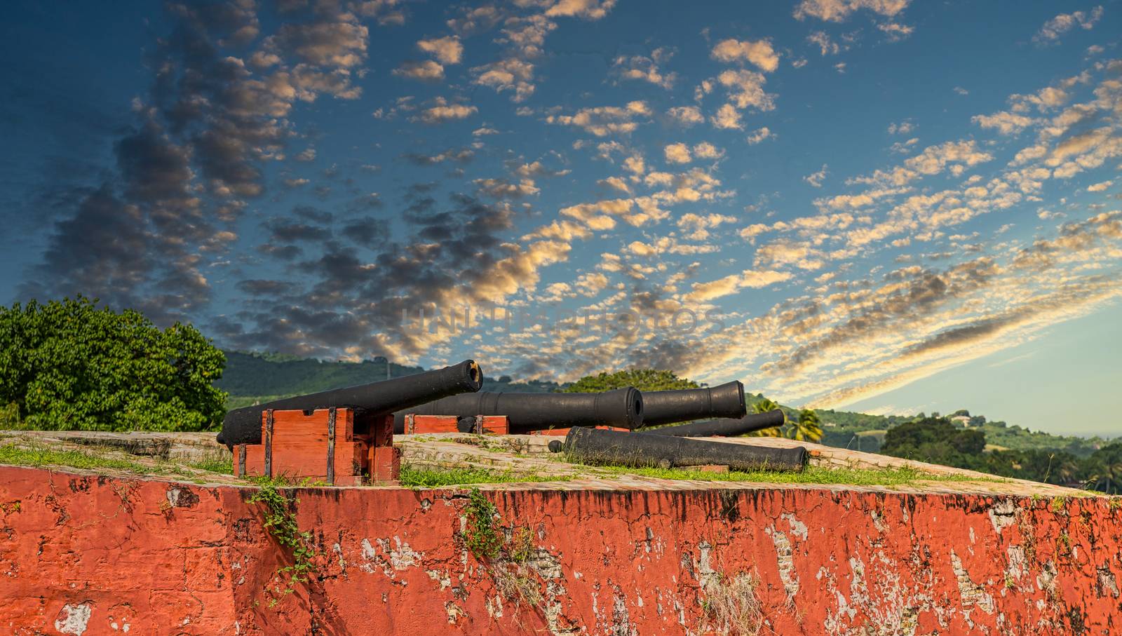 Cannons on Old Red Fort at Sunrise by dbvirago