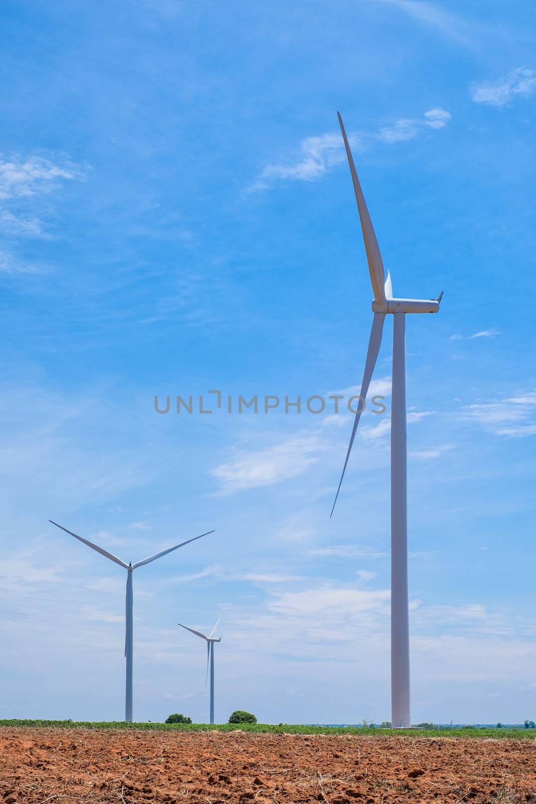 Wind turbine power at daylight  by Surasak