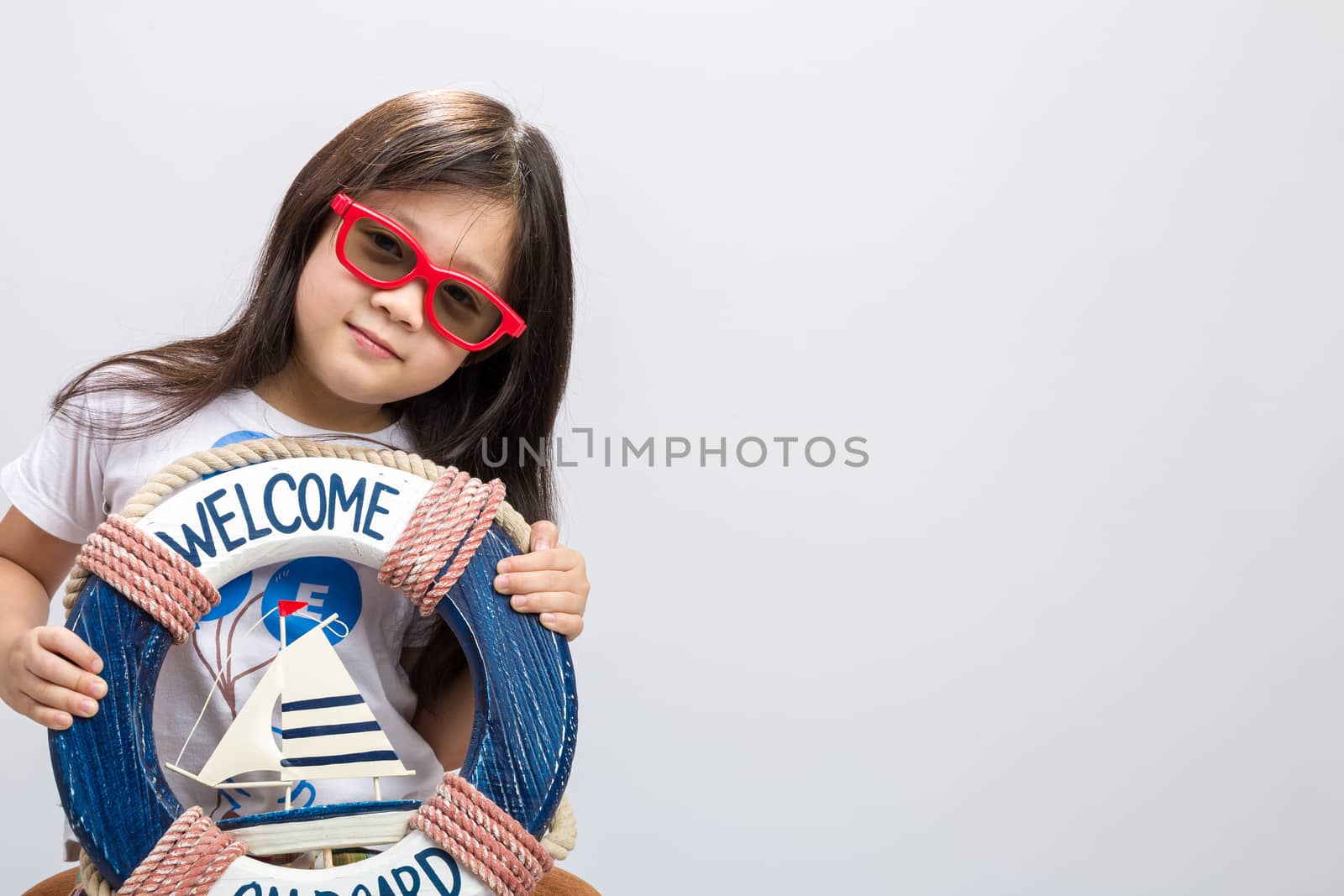 Little kid on summer vacation to beach concept background.