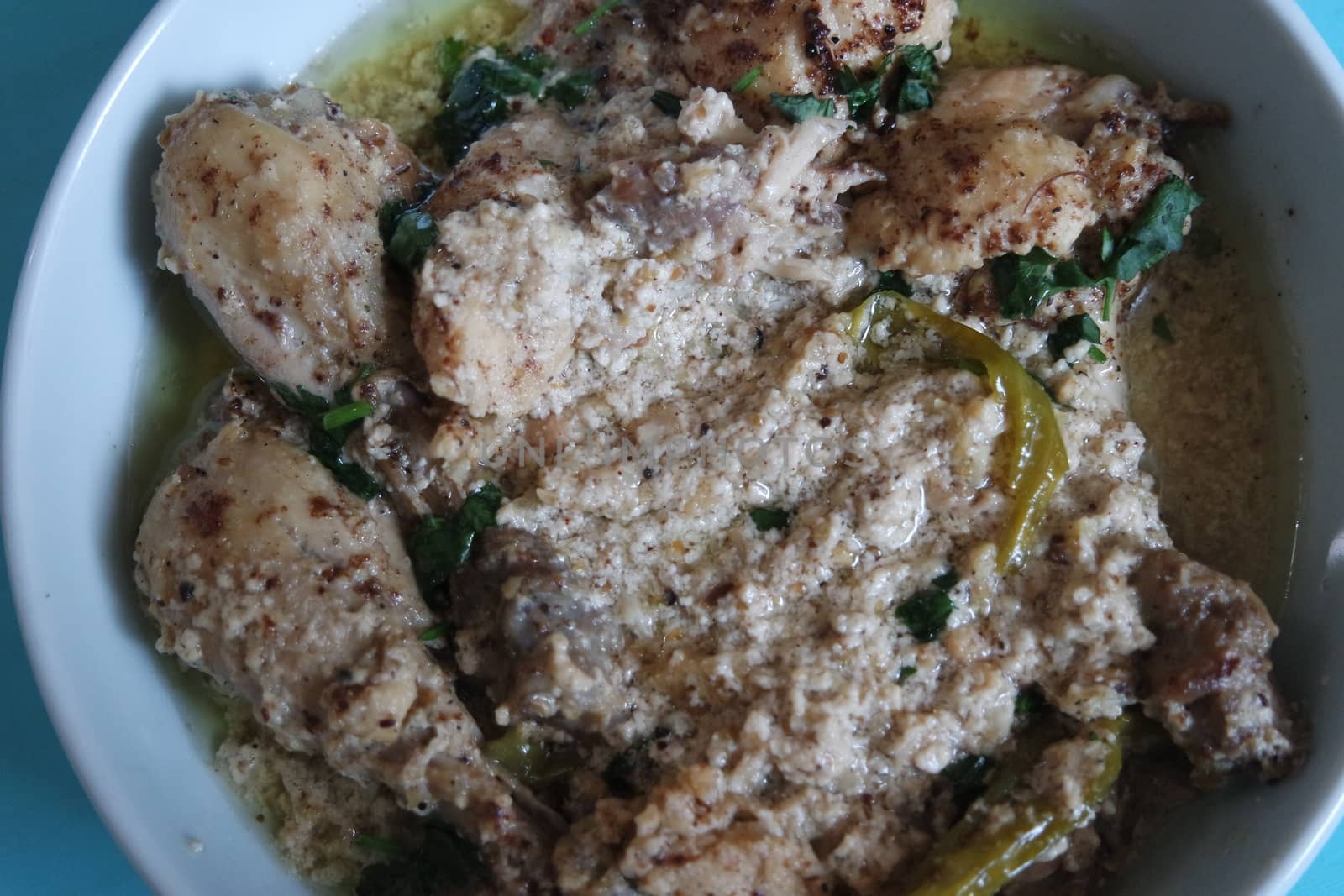 Homemade chicken qorma or white qorma dish. Traditional dish for parties and ceremonial purpose popular in South Asian countries like Pakistan, India and Bangladesh