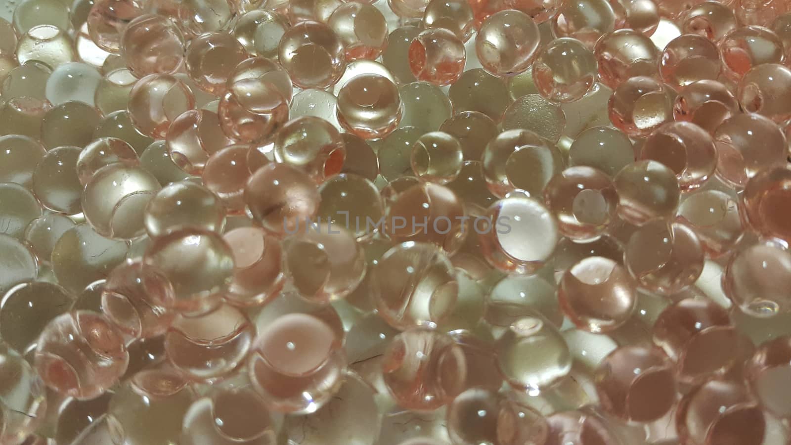 Closeup view with selective focus of shiny glittering orbeez by Photochowk