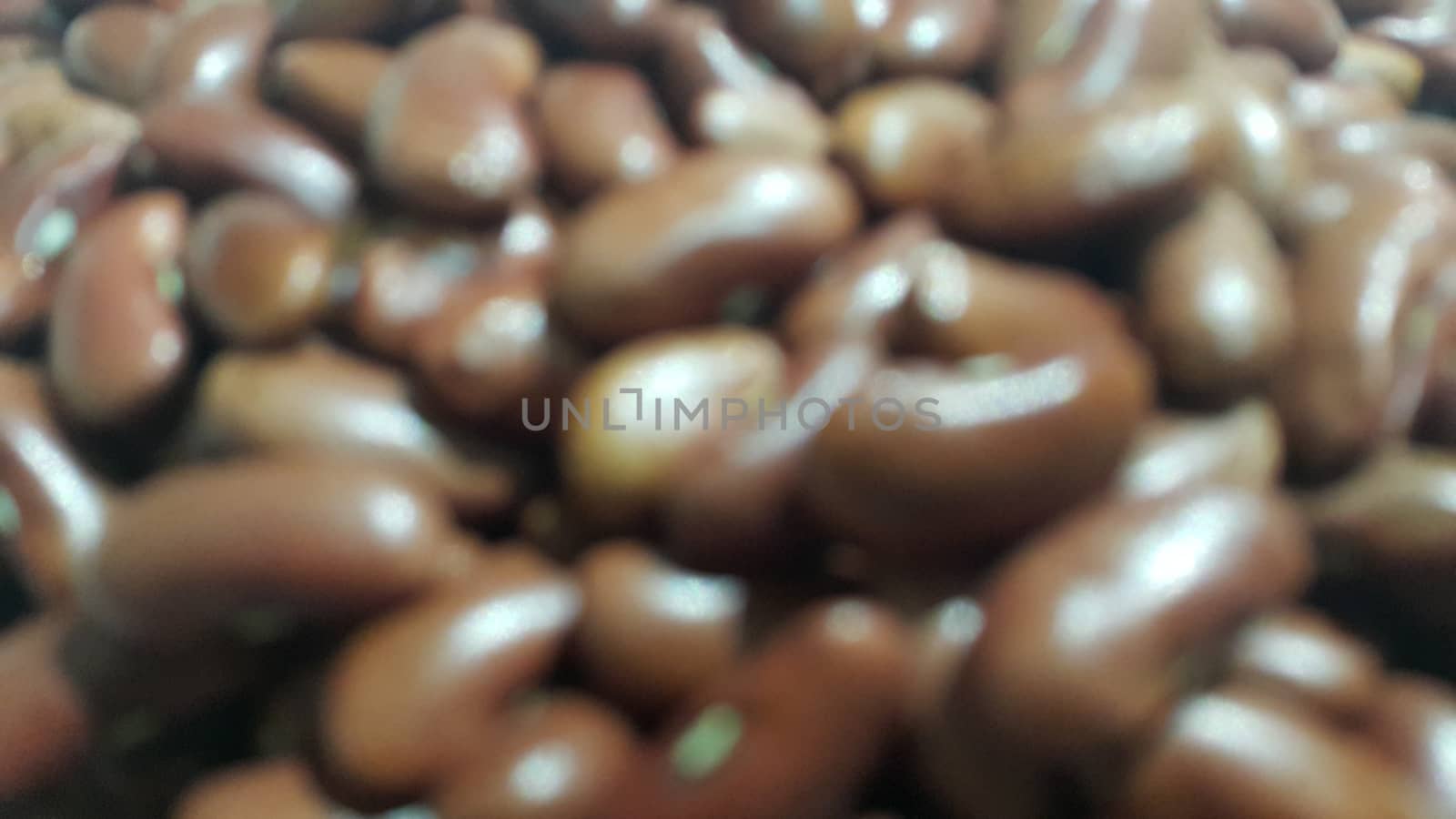 Kidenry beans: Closeup view of uncooked red kidney beans by Photochowk