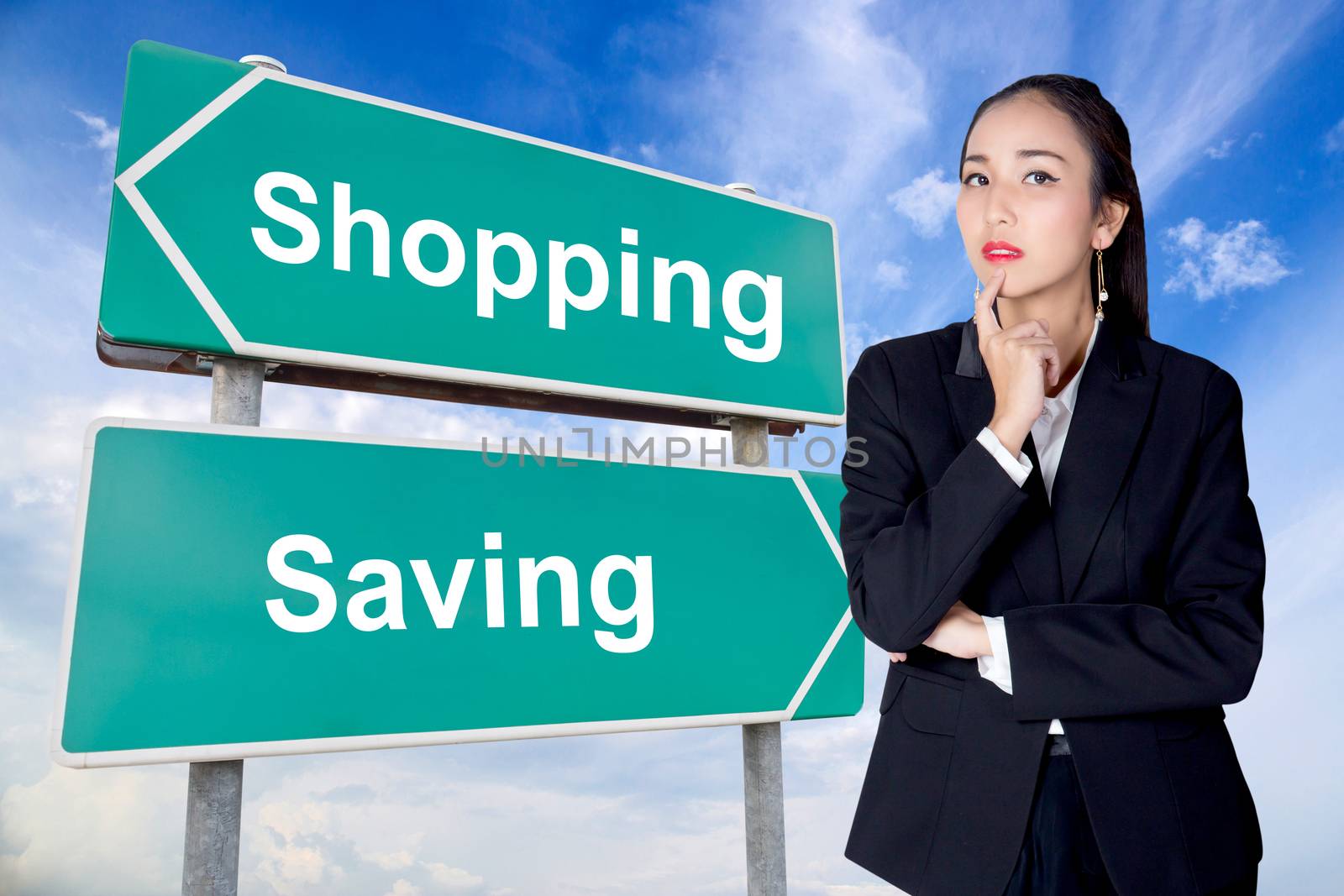 Spend save road sign with business woman thinking choice direction