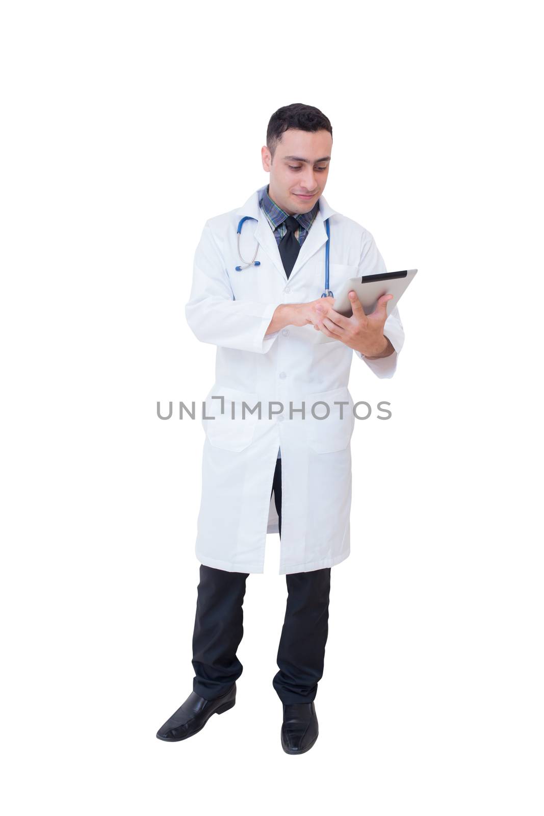 Doctor holding a tablet computer while using it isolated on whit by nnudoo