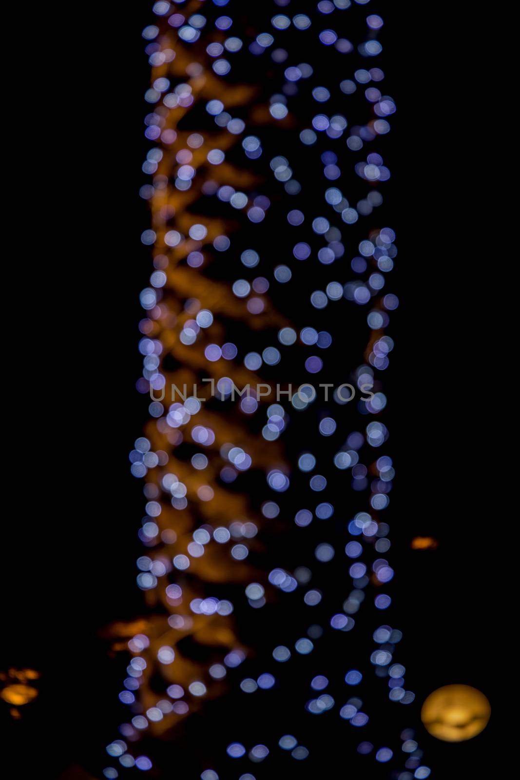 Christmas background. Festive xmas abstract background with bokeh defocused lights.