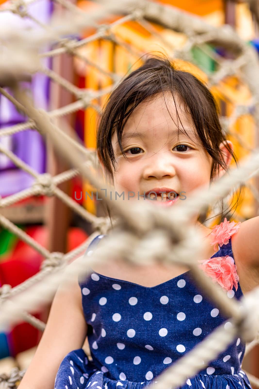 Kid Playing on Playground / Happy Kid Playing on Playground by supparsorn