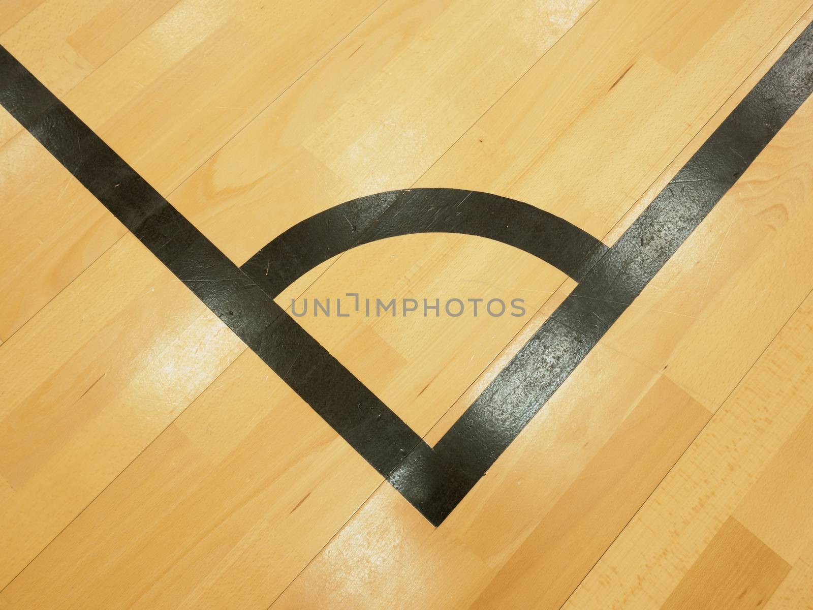 Black corner. Worn out wooden floor of sports hall by rdonar2
