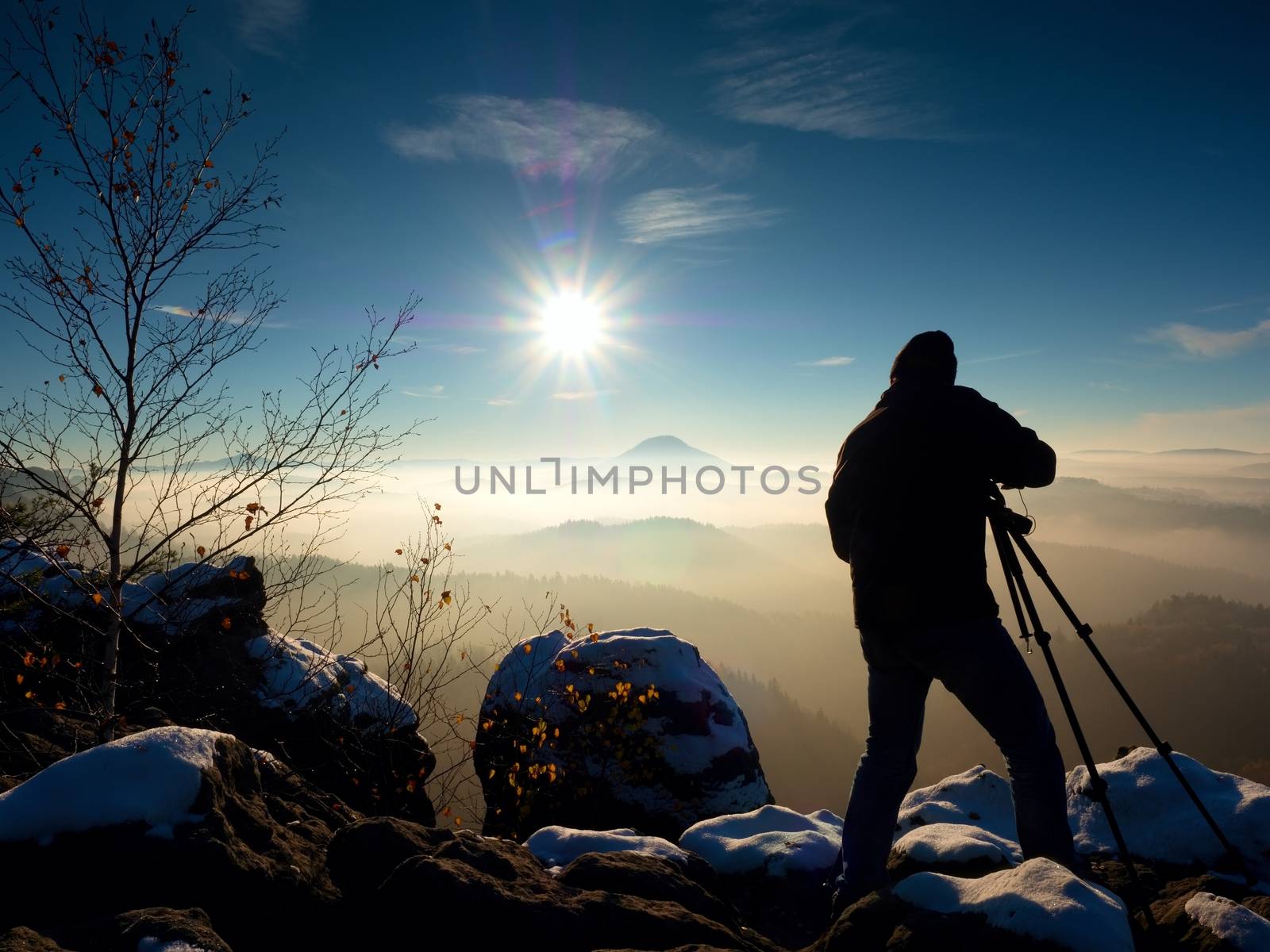Photographer takes picture of freeze autumnal  landscape by rdonar2