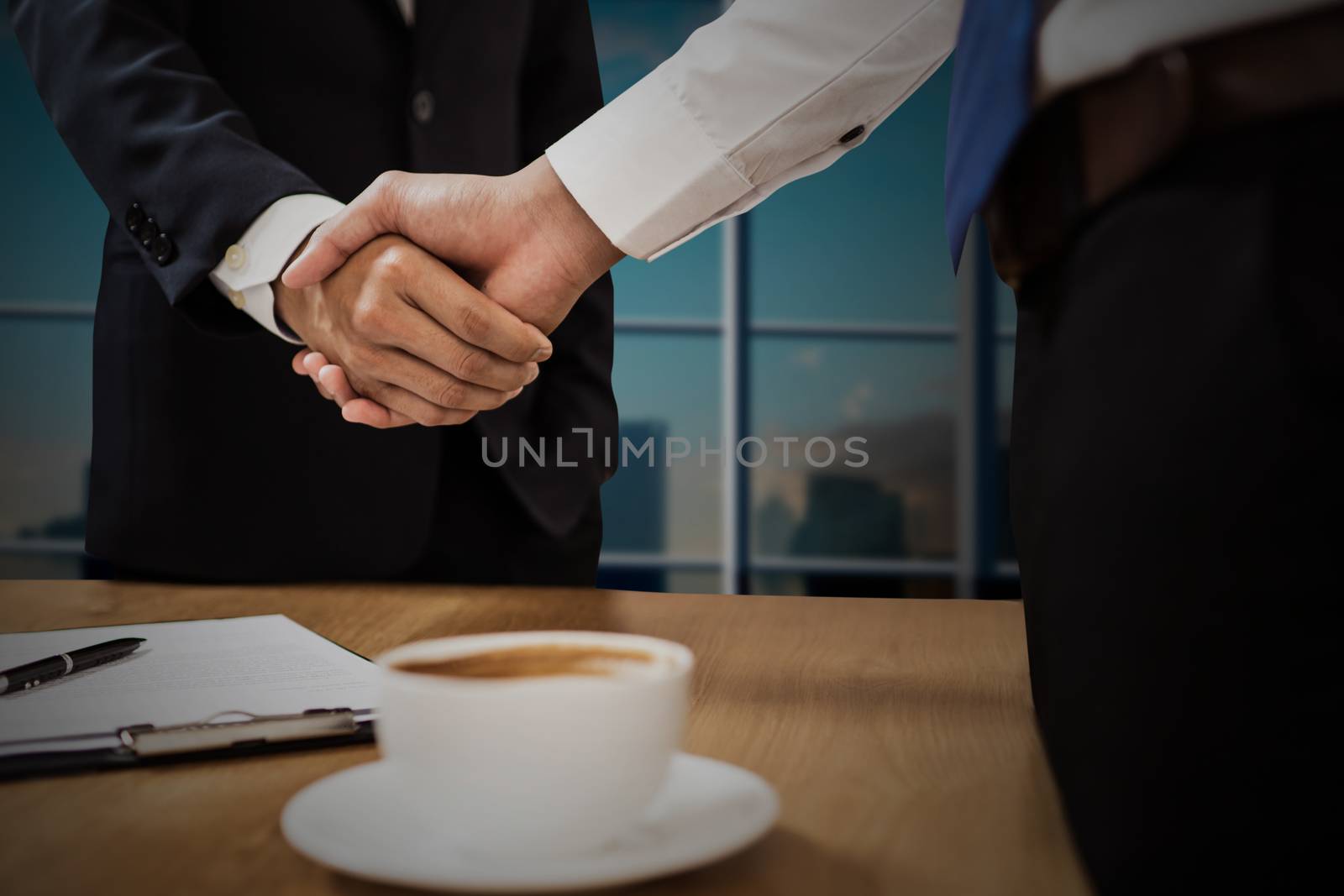 successful cooperation and confident partner concept, people shake hands with customer after successful agreement business