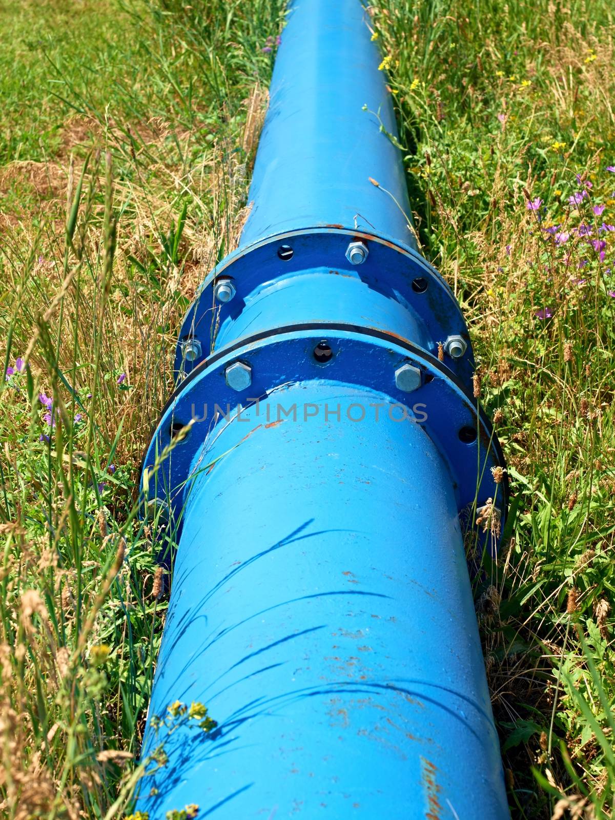 Repaired  water pipes with blue flanges and screws  by rdonar2