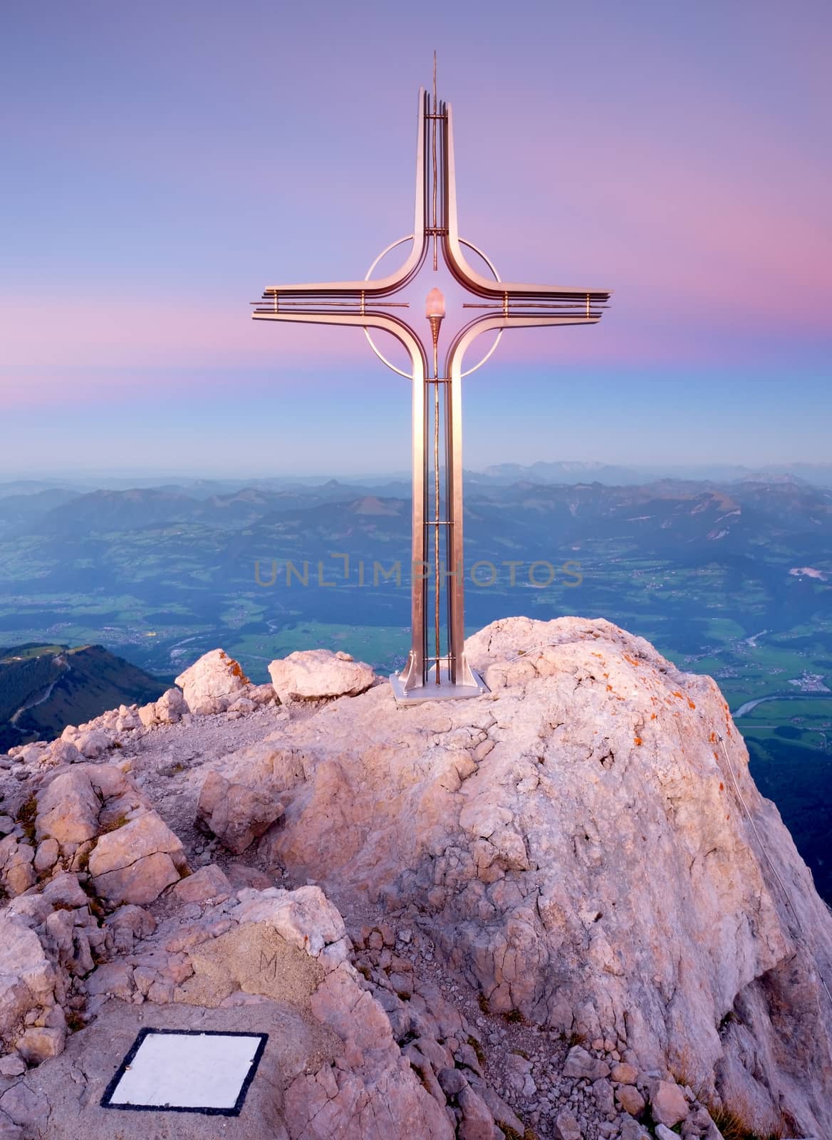 Peak of Hoher Göll. Iron cross at mountain top in Alp at Austria Germany border.  by rdonar2