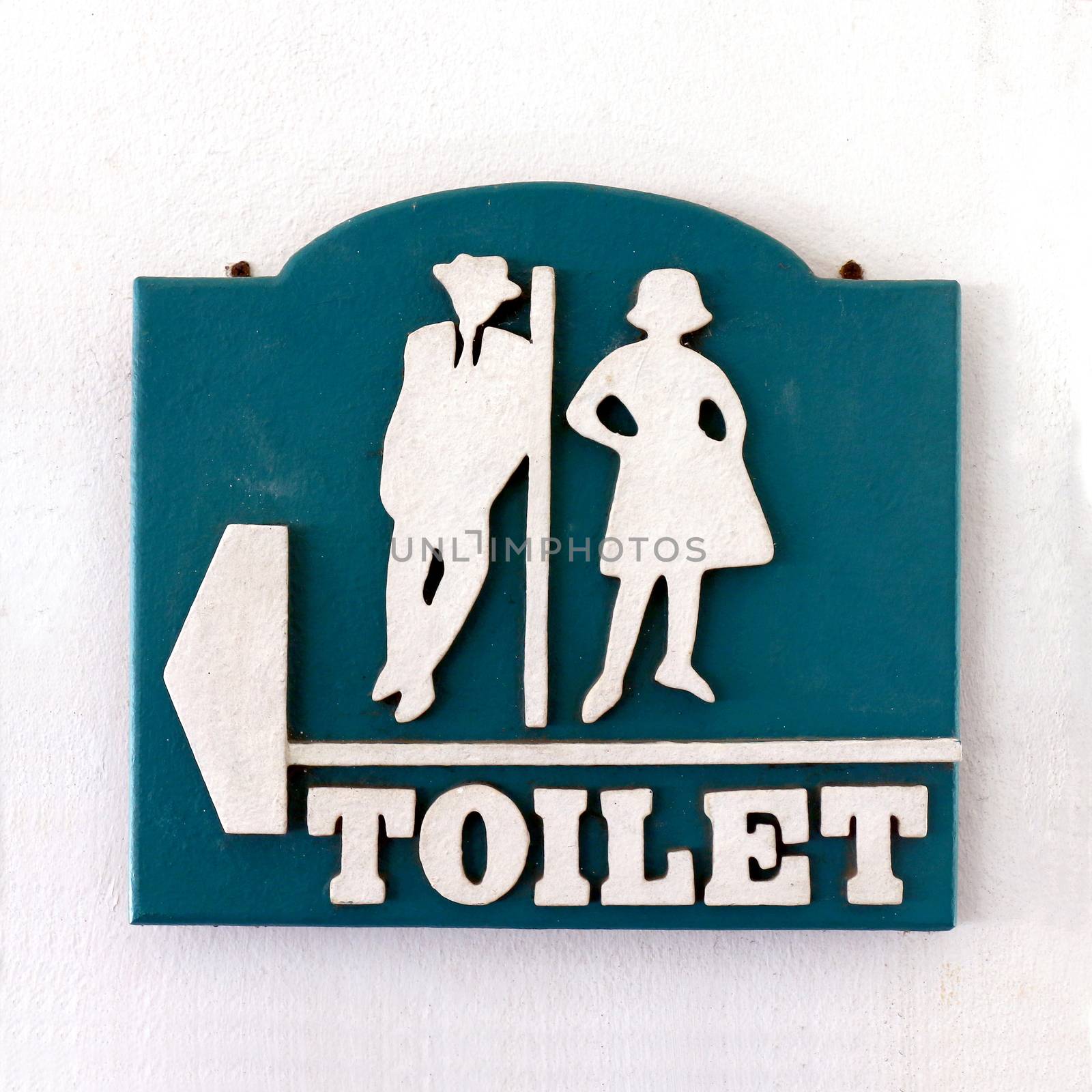 Bathroom sign, Public sign toilet male-female old vintage style on the wall of white cement, Toilet sign by cgdeaw