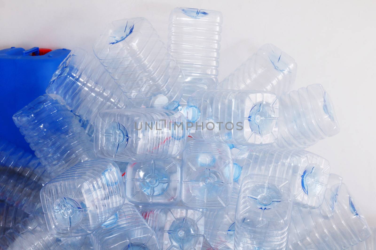 Stacks of clear plastic bottles, Garbage plastic bottle recycle by cgdeaw