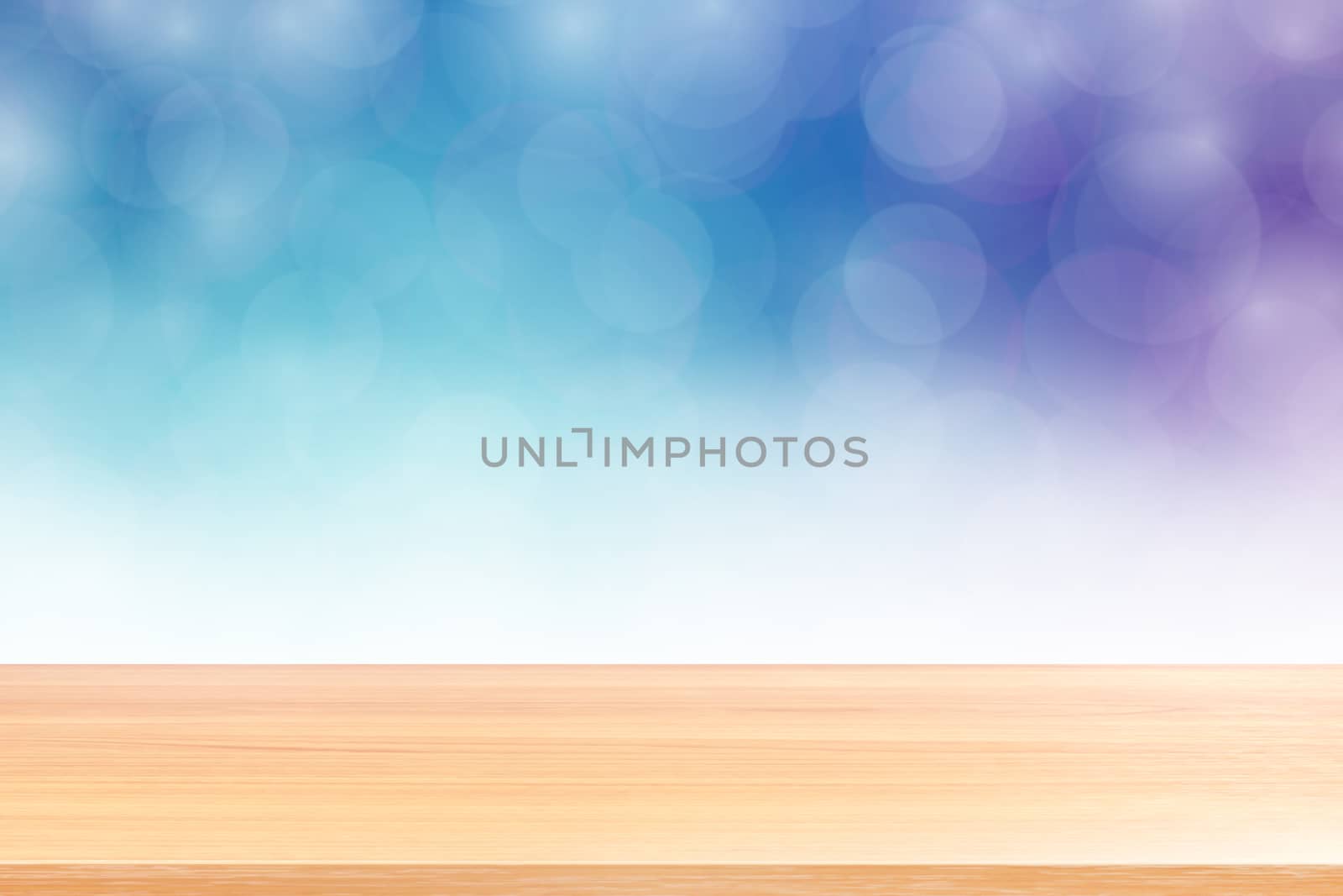 empty wood table floors on blurred bokeh soft blue white gradient background, wooden plank empty on blue bokeh colorful light shade, colorful bokeh lights gradient soft for banner advertising products