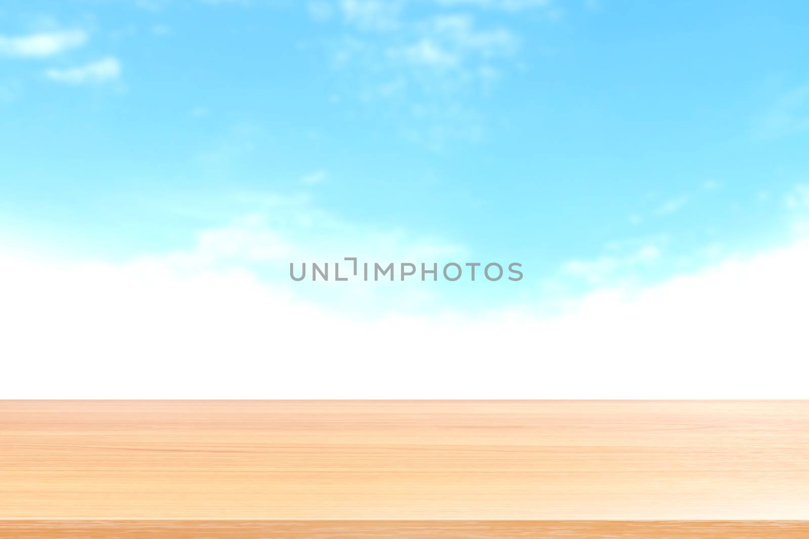 empty wood table floors on blurred blue sky and cloud background, wood table board empty front blur sky blue, wooden plank blank on sky with perspective brown wood table for mock up display products