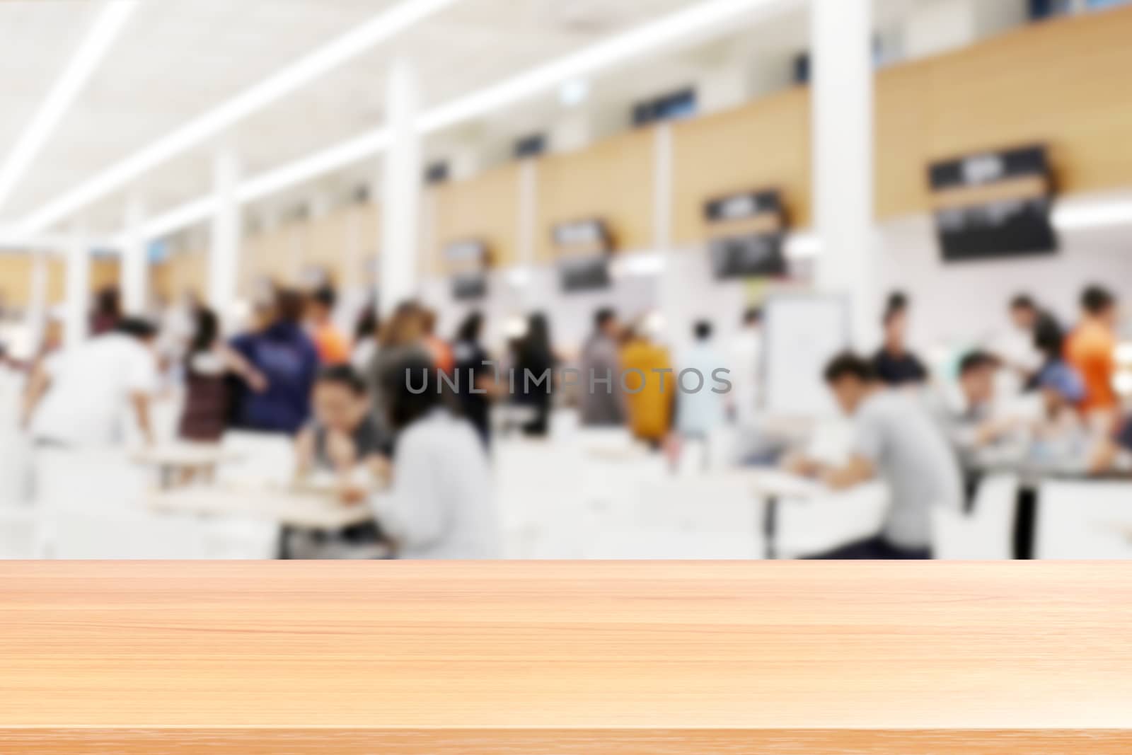 wood plank on blur canteen dining hall room, empty wood table floors on a lot of people are eating food in university canteen blur background, wood table board empty on blur cafe or cafeteria canteen by cgdeaw